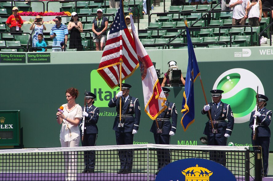 The Homestead Air Reserve Base honor guard gave a brilliant display of colors during the national anthem which was sung by Leah Partridge, an internationally renowned opera sensation and star of the opera Cyrano. (U.S. Air Force Photo by Senior Airman Lou Burton, 482nd Fighter Wing Public Affairs)