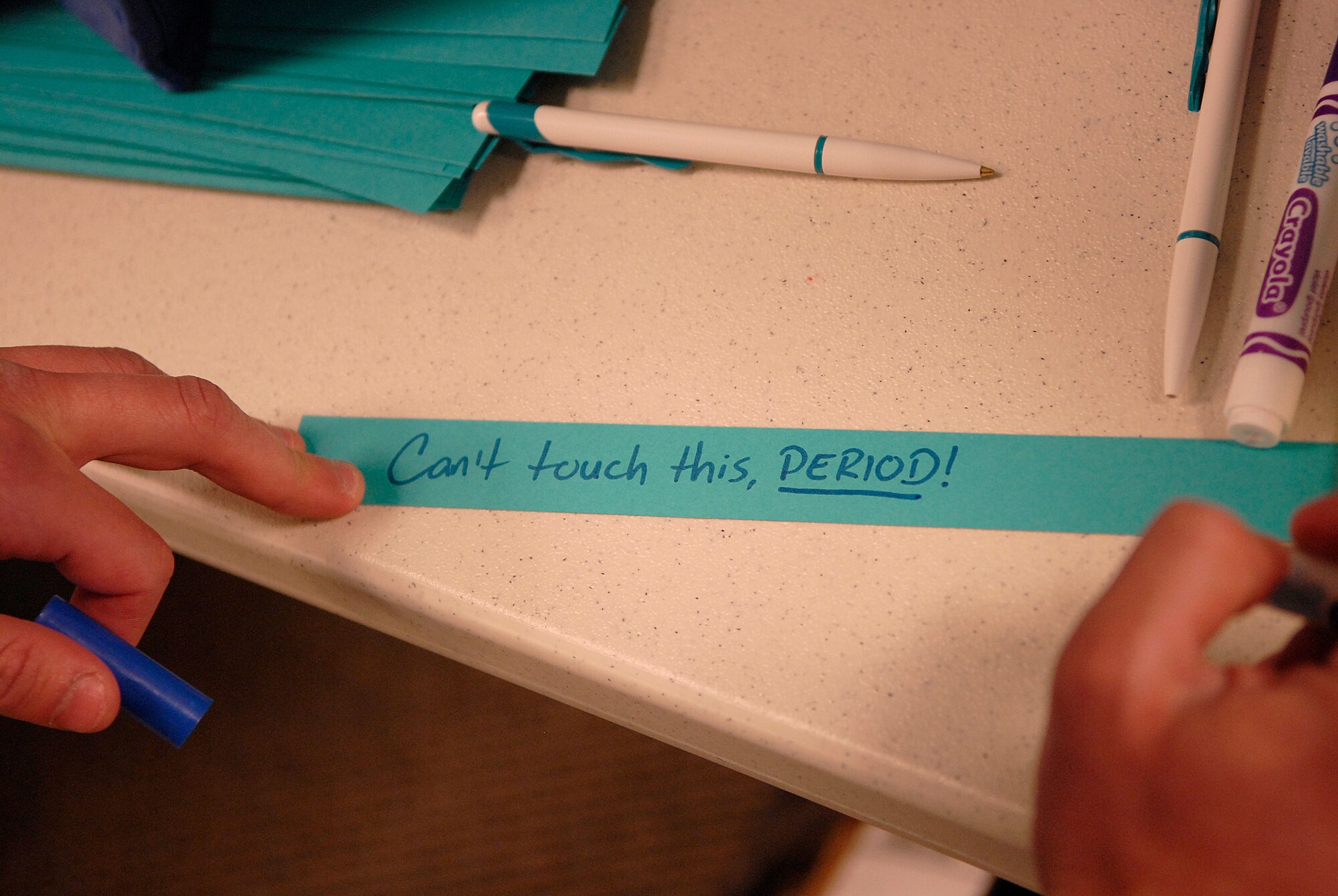 VANDENBERG AIR FORCE BASE, Calif. -- Airman 1st Class Gusttavo Behrens, a 30th Medical Operations Squadron bio-environmental technician, writes inspirational words at the dining facility in support of Sexual Assault Awareness Month here Thursday, April 7, 2011.  The Sexual Assault Prevention and Response office displayed their message to help Team V members gain awareness toward preventing future sexual assaults from occurring.  (U.S. Air Force photo/Staff Sgt. Andrew Satran) 

  