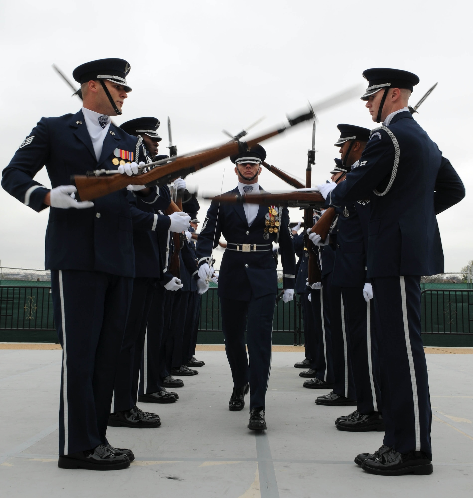 The U.S. Air Force Honor Guard drill team competes April 9 at the Jefferson Memorial, Washington D.C. The 4th Annual Joint Service Drill Exhibition showcased the strength, dexterity and bearing of the men and women of the U.S. Armed Forces. (U.S. Air Force photo by Senior Airman Christopher Ruano)