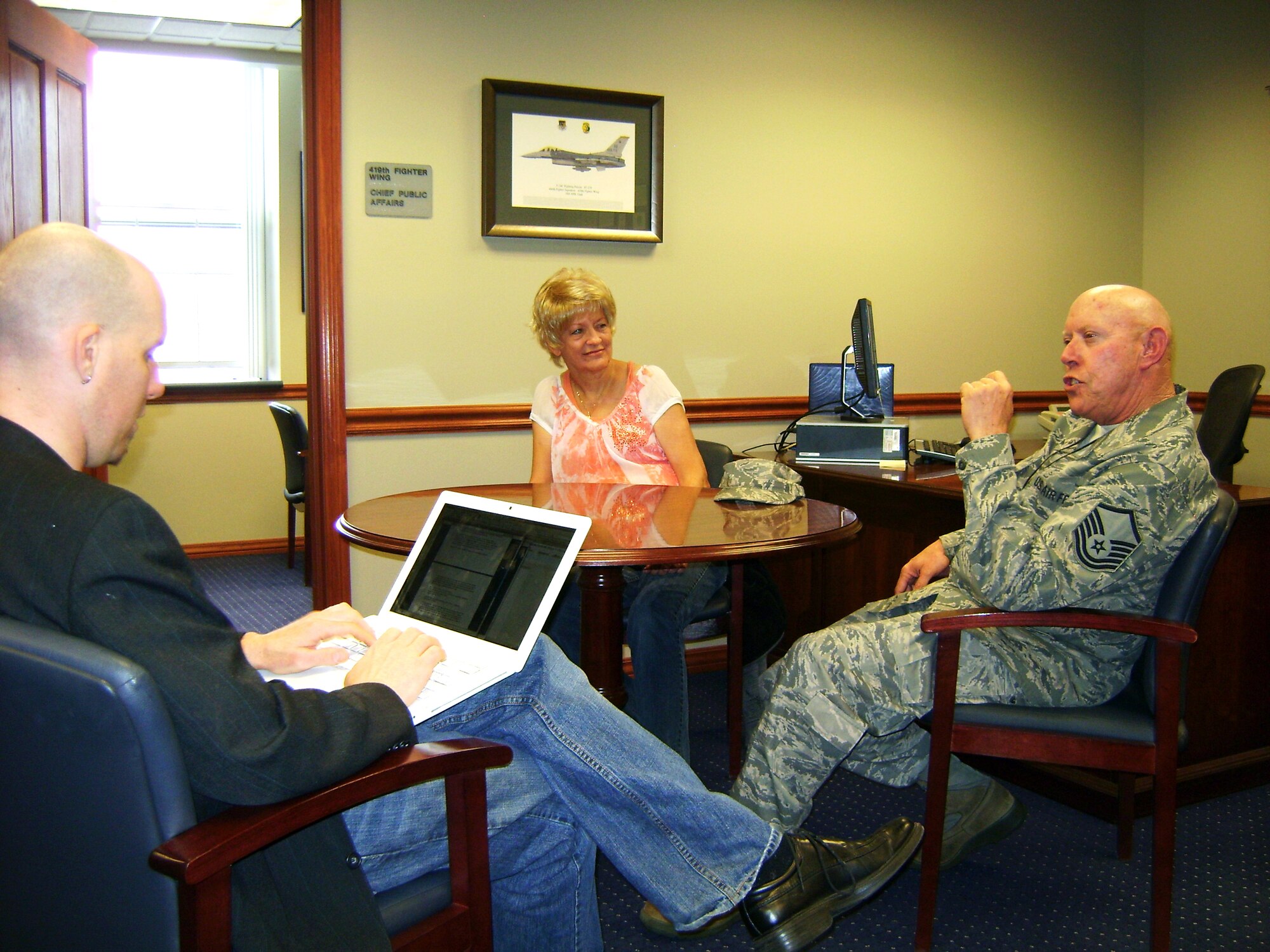 Master Sgt. Ken Payne and wife, Ann, talk to Salt Lake Tribune reporter Matthew LaPlante about his experience serving in both Vietnam and Iraq. Sergeant Payne is retiring after nearly 40 years of service. (U.S. Air Force photo/Kari Tilton)