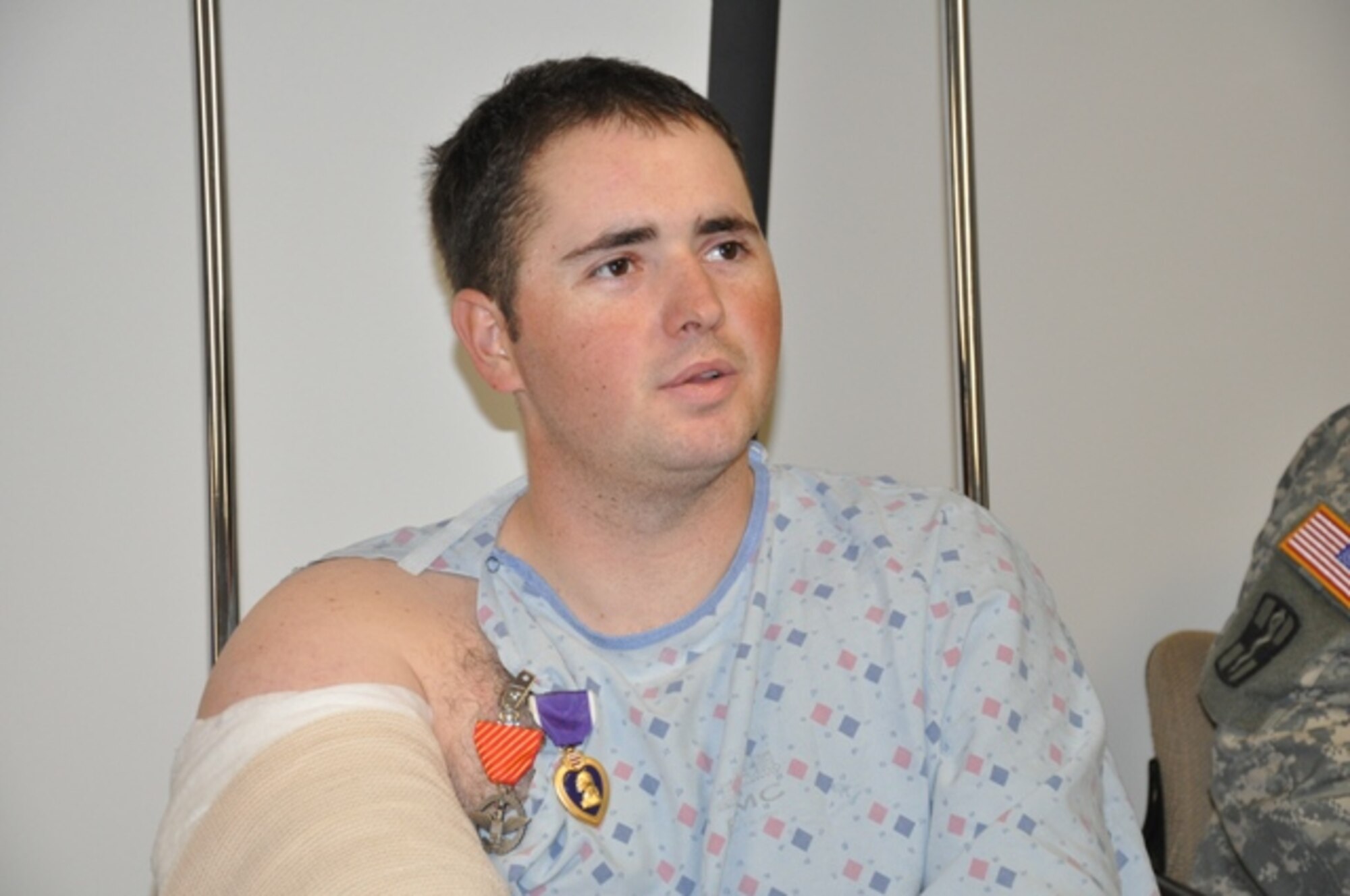 FORT SAM HOUSTON, Texas -- Senior Airman Erik J. Schadler, an explosive ordnance disposal specialist assigned to the 21st Civil Engineering Squadron at Peterson AFB, Colo., was awarded the Purple Heart and Air Force Combat Action medals for wounds received in action while taking part in Operation Enduring Freedom March 21. Airman Schadler is a native of Las Cruces, N.M. (Photo by Russell Fritz)
