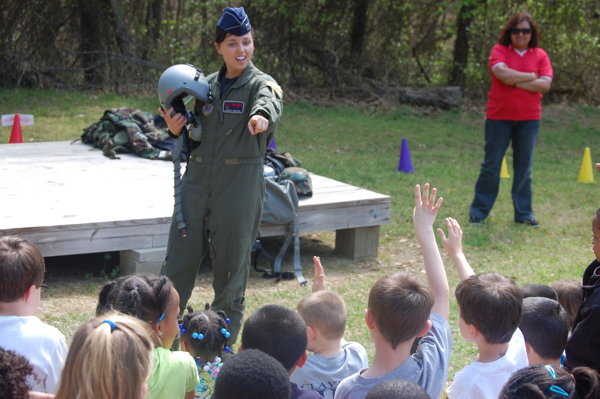 Capt. Jessica Guarini, 911th Air Refueling Squadron pilot, talks to a group of elementary students during Cooper Elementary's Community Day on April 8. (USAF photo by Maj. Shannon Mann, 916ARW/PA)