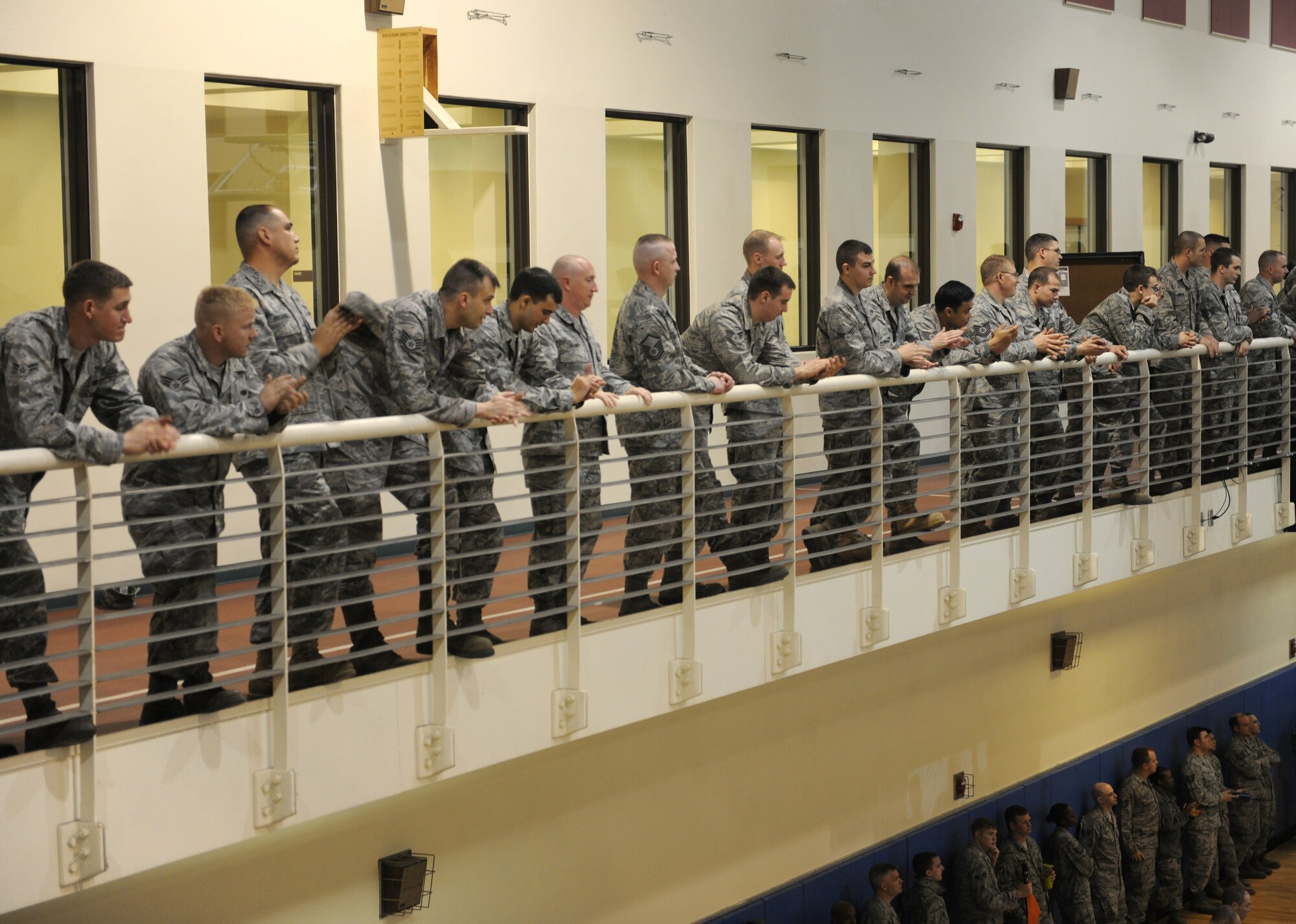 KUNSAN AIR BASE, Republic of Korea – Members of the Wolf Pack applaud after hearing the final results April 11, 2011 from the 2011 Pacific Air Force Operational Readiness Inspection here. The wing scored an overall rating of “Excellent.” (U.S. Air Force photo/Senior Airman Ciara Wymbs)
