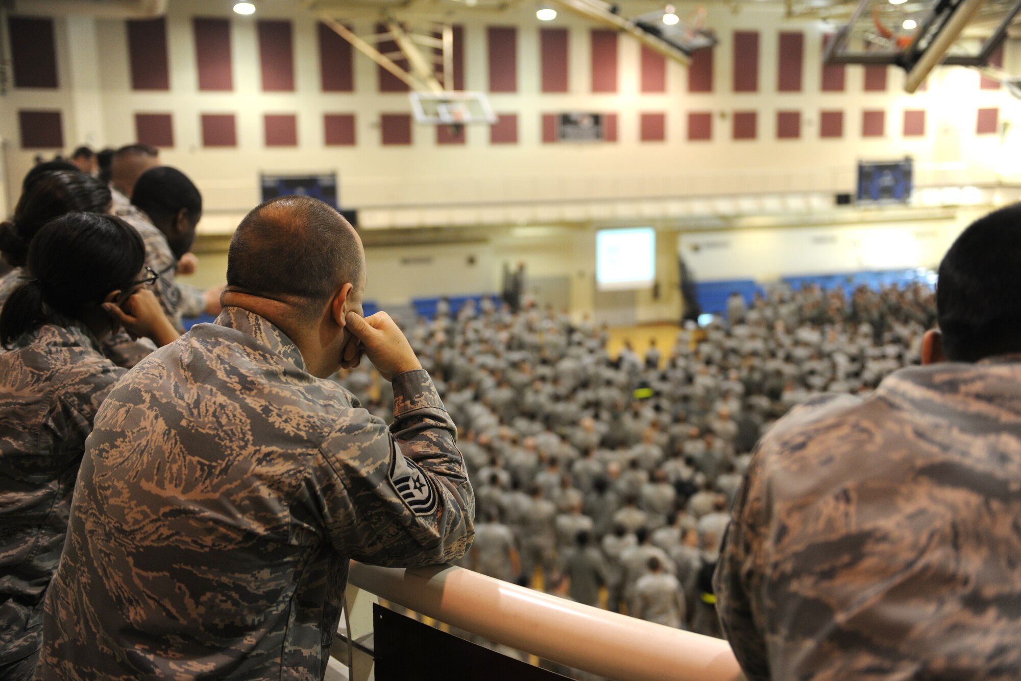 KUNSAN AIR BASE, Republic of Korea -- Members of the Wolf Pack focus their attention as the results from the 2011 Pacific Air Force Operational Readiness Inspection are announced here April 11, 2011. The wing scored an overall rating of “Excellent.” (U.S. Air Force photo/Senior Airman Ciara Wymbs)