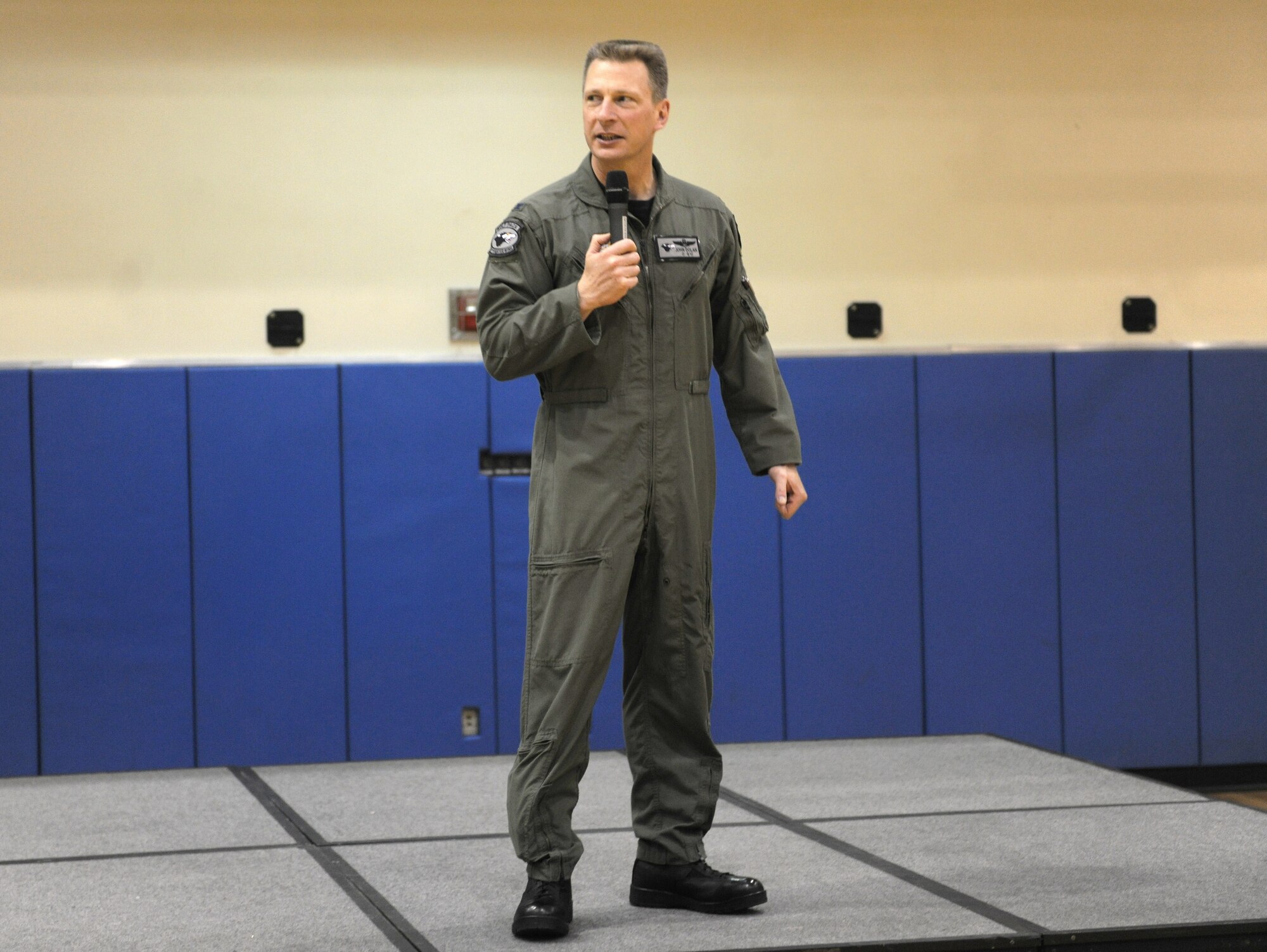 KUNSAN AIR BASE, Republic of Korea -- Col. John Dolan, 8th Fighter Wing commander, speaks to the WolfPack April 11, 2011 about the performance of the wing during the 2011 Pacific Air Force Operational Readiness Inspection here. The wing scored an overall rating of “Excellent.” (U.S. Air Force photo/Senior Airman Ciara Wymbs)
