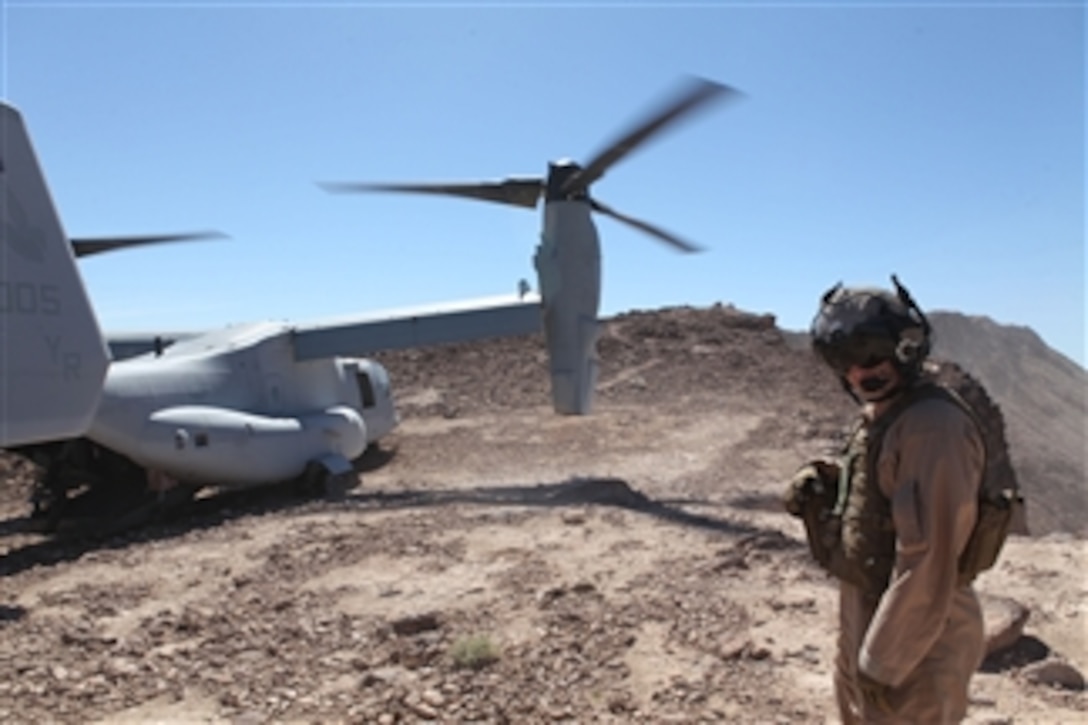 A U.S. Marine Corps MV-22 Osprey tiltrotor aircraft lands in the Imperial Valley Desert in California on April 1, 2011.  The MV-22 crew was test-landing the aircraft at different field locations to ensure they would be appropriate landing zones during Weapons and Tactics Instructor Course 2-11, hosted by Marine Aviation Weapons and Tactics Squadron 1.  