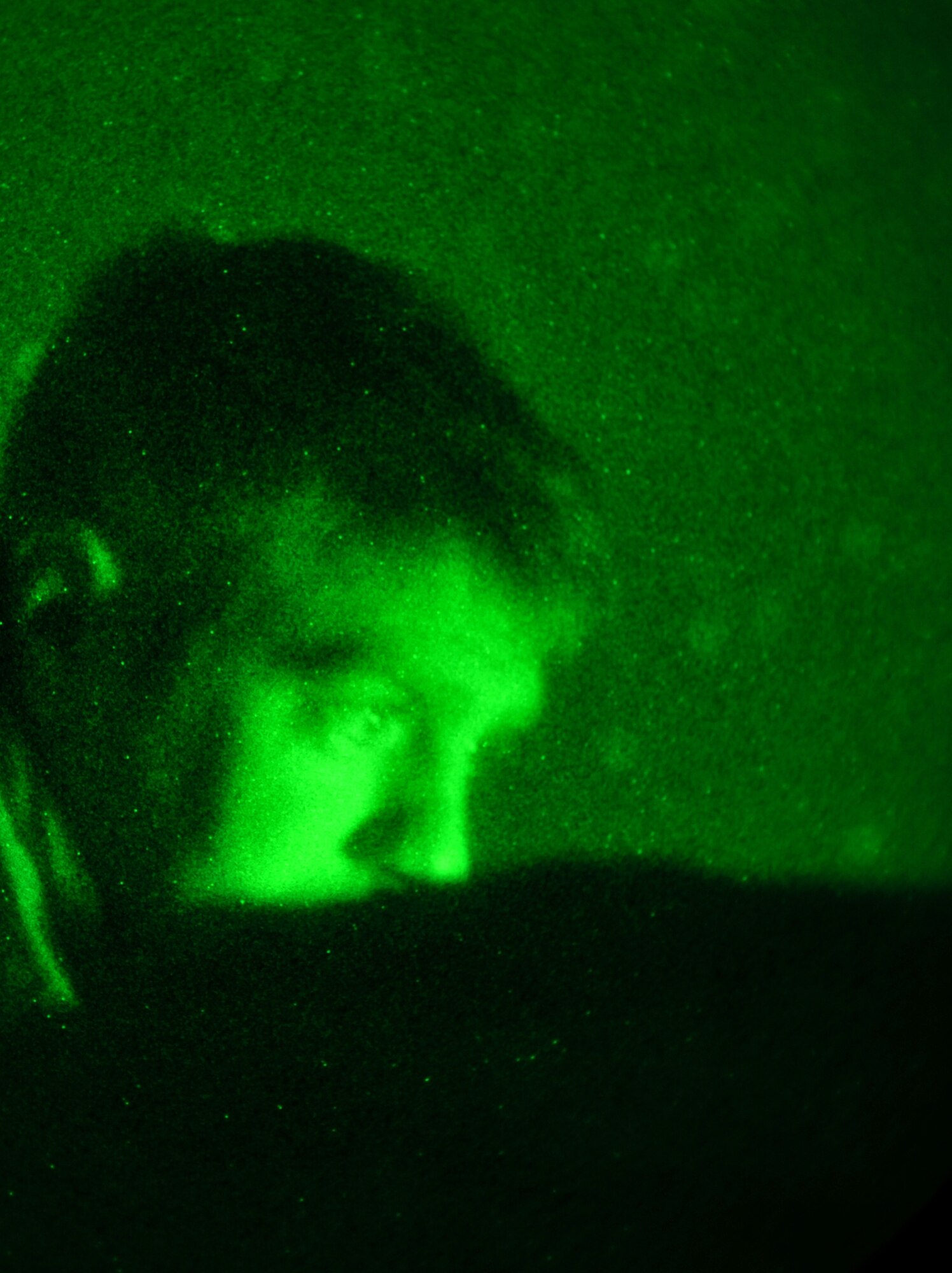 Tech. Sgt. Jonathan Oliver communicates with an F-16 Fighting Falcon pilot while watching a live feed of the aircraft's targeting pod March 27, 2011, during Operation Bull Whip in Laghman province, Afghanistan. Sergeant Oliver is a joint terminal attack controller assigned to Bagram Airfield's 817th Expeditionary Air Support Operations Squadron. (U.S. Air Force photo/Capt. Erick Saks)