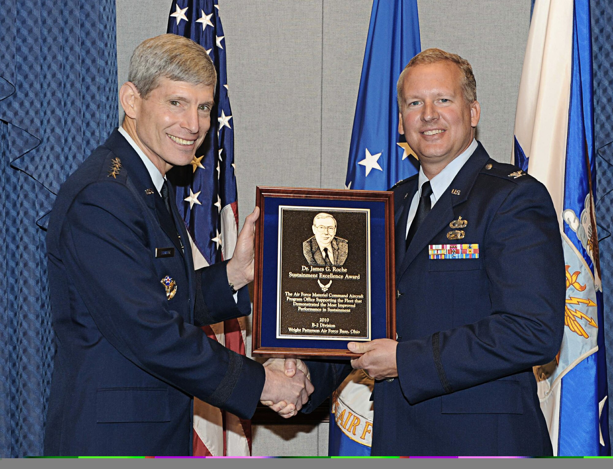 Air Force Chief of Staff Gen. Norton Schwartz presents the 2010 Dr. James G. 
Roche Sustainment Excellence Award to Col. Mark Williams, Chief of the B-2 Division at Wright-Patterson Air Force Base, Ohio, during a ceremony in the Pentagon April 11, 2011. Colonel Williams represented all the members of the B-2 Spirit division, which won the award for demonstrating the most improved performance in aircraft maintenance and logistics readiness.  (U.S. Air Force photo/Andy Morataya)
