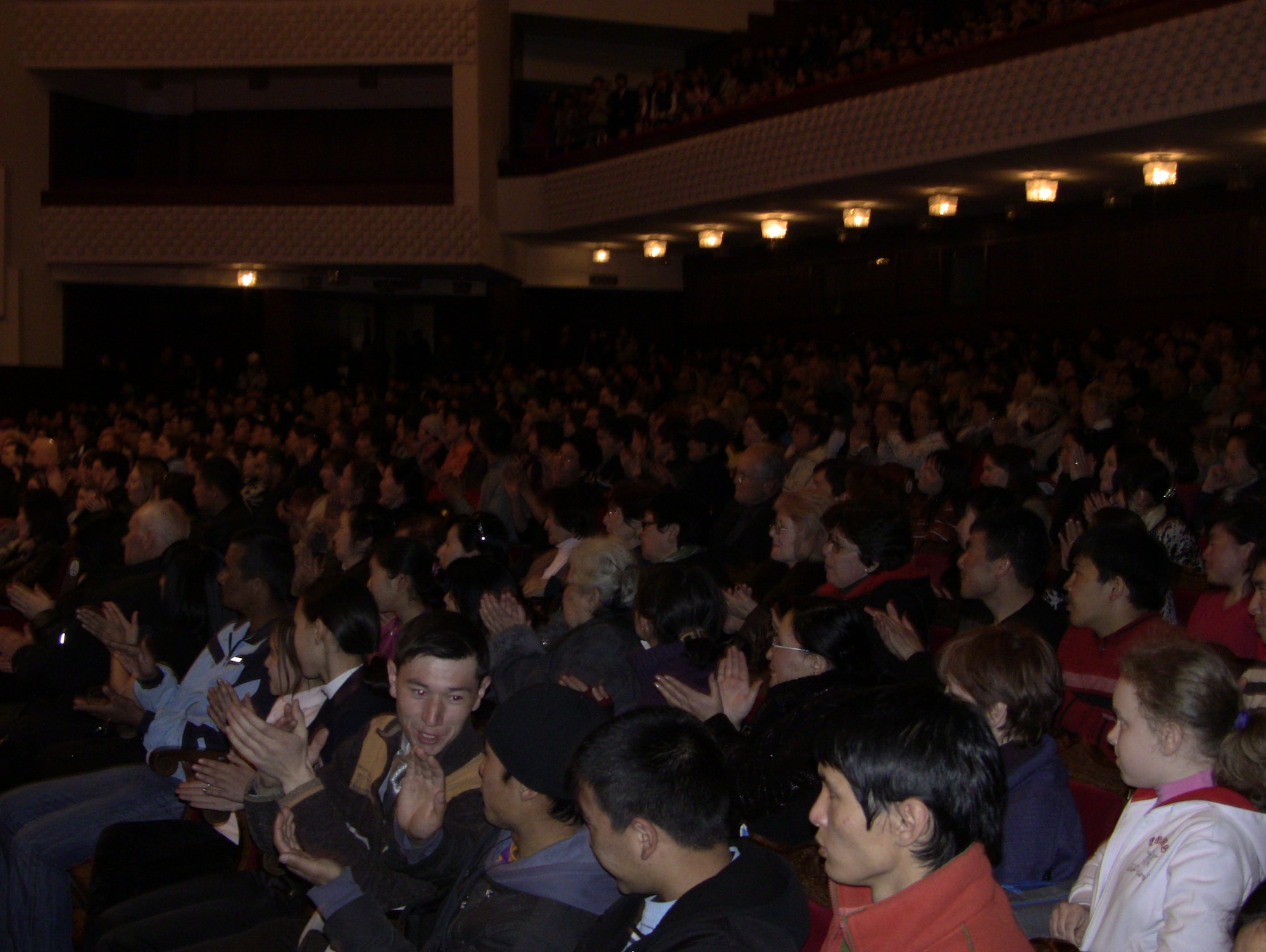 Standing room only crowd at State Philharmonic Theatre in downtown Bishkek enjoys the AFCENT Band Wild Blue Country's performance. (U.S. Air Force photo by Master Sgt. Karl Bradley)