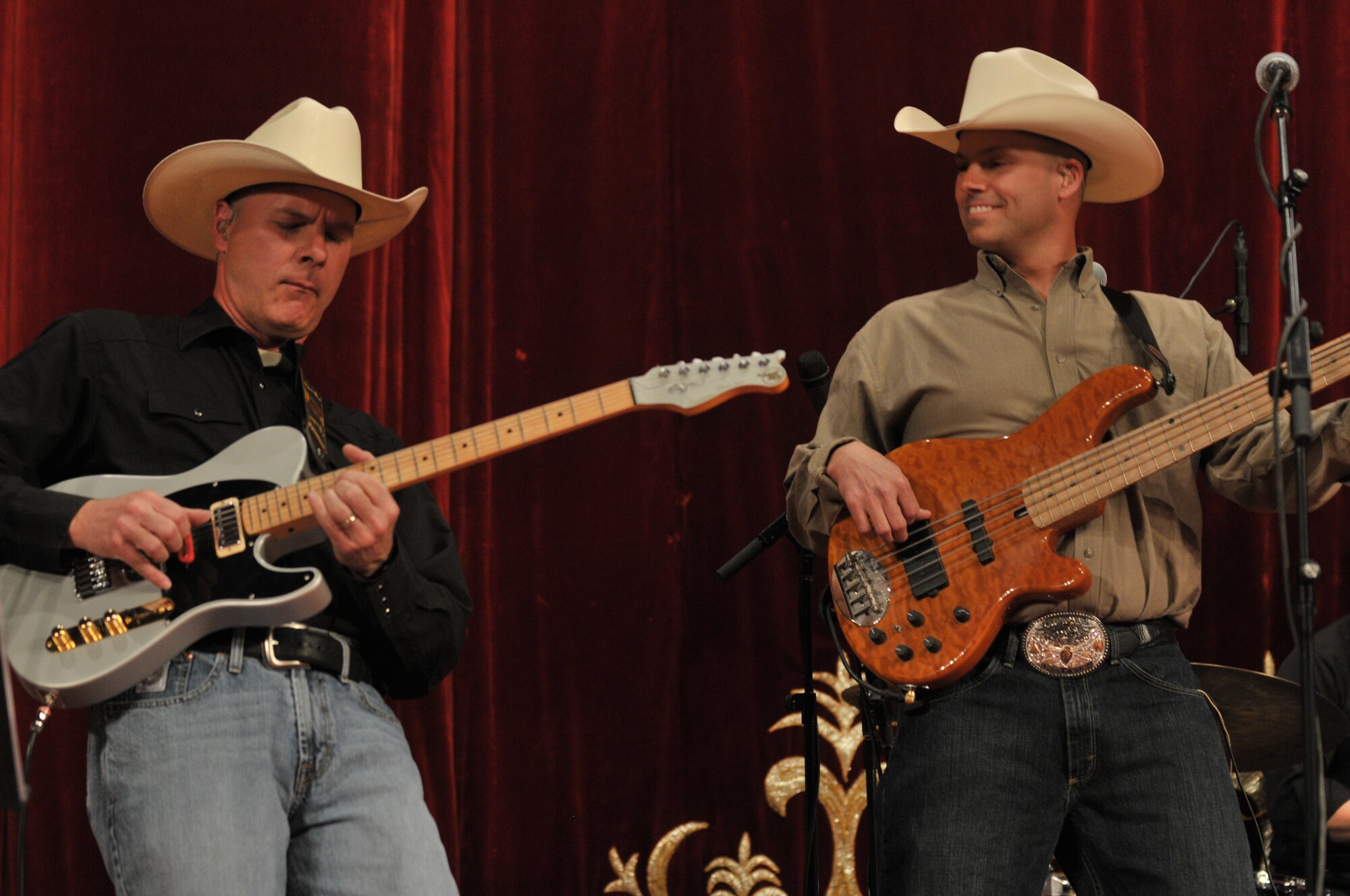 AFCENT Band Superintendant, Senior Master Sgt. Jerome Oddo & AFCENT Band NCOIC Technical Sgt. Stephen Brannen entertain a full-house at the State Philharmonic Theatre in Bishkek. (U.S. Air Force photo by Staff Sgt. Stacy Moless)