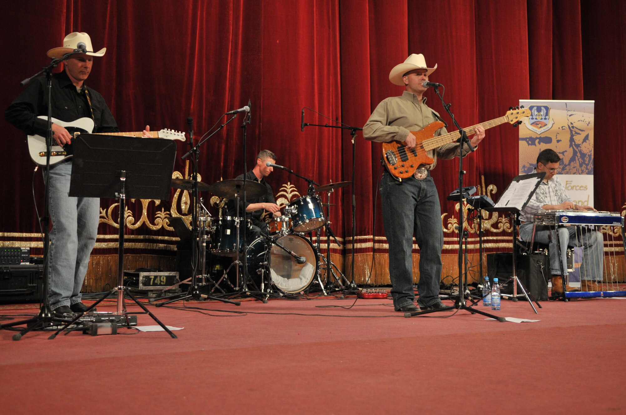 AFCENT Band Wild Blue Country performs for a standing room only crowd at the State Philharmonic Theatre in downtown Bishkek. The U.S. Embassy to Kyrgyzstan hosted the free event. (U.S. Air Force Photo by Staff Sgt. Stacy Moless)