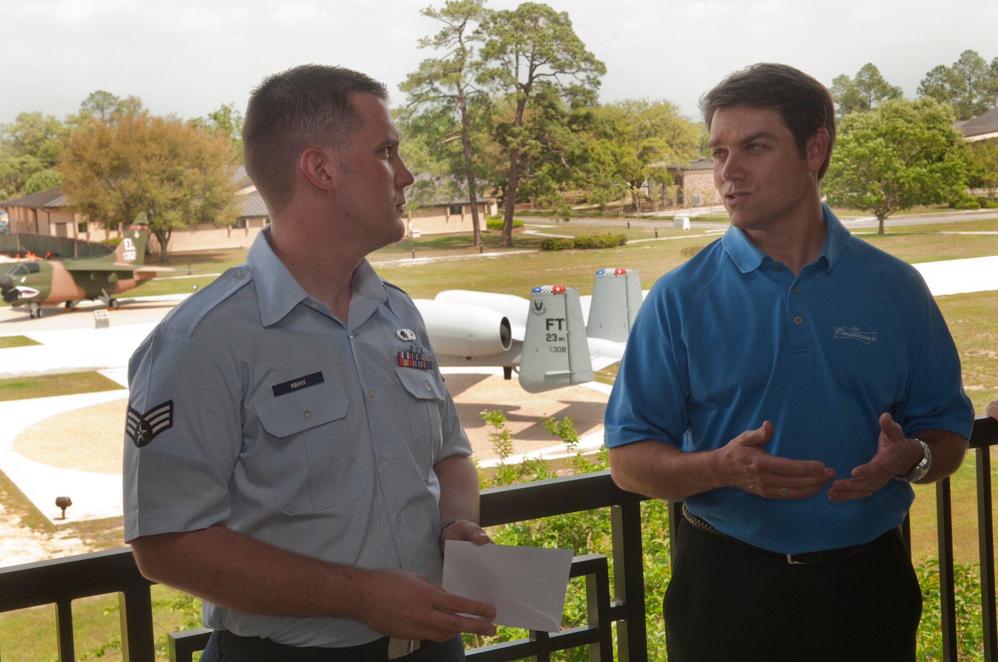 MOODY AIR FORCE BASE, Ga. -- Senior Airman Michael Inman, Sober Ride president, talks with Tim Keller, community member, after receiving a check on behalf of Sober Ride April 11. The Sober Ride program provides anonymous free rides to any Department of Defense cardholder who is unable to drive because they are impaired by alcohol. (U.S. Air Force photo/Airman 1st Class Douglas Ellis)(RELEASED)
