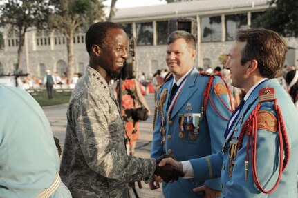 Gen. Edward A. Rice, Jr., Air Education and Training Command commander, meets with two members of the Texas Cavaliers during a Fiesta Celebration at Fort Sam Houston, Texas, April 9. Fiesta is an annual two-week celebration held in San Antonio. (U.S. Air Force photo/Airman Alexis Siekert)