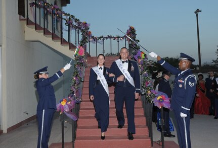 Staff Sgt. Jillian Pass and Maj. Paul Ferguson, Air Force ambassadors, arrive at the Fiesta 2011 opening ceremony at the Parr O'Club April 6 at Randolph Air Force Base, Texas. Fiesta is an annual two-week celebration held in San Antonio. (U.S. Air Force photo/Joel Martinez)