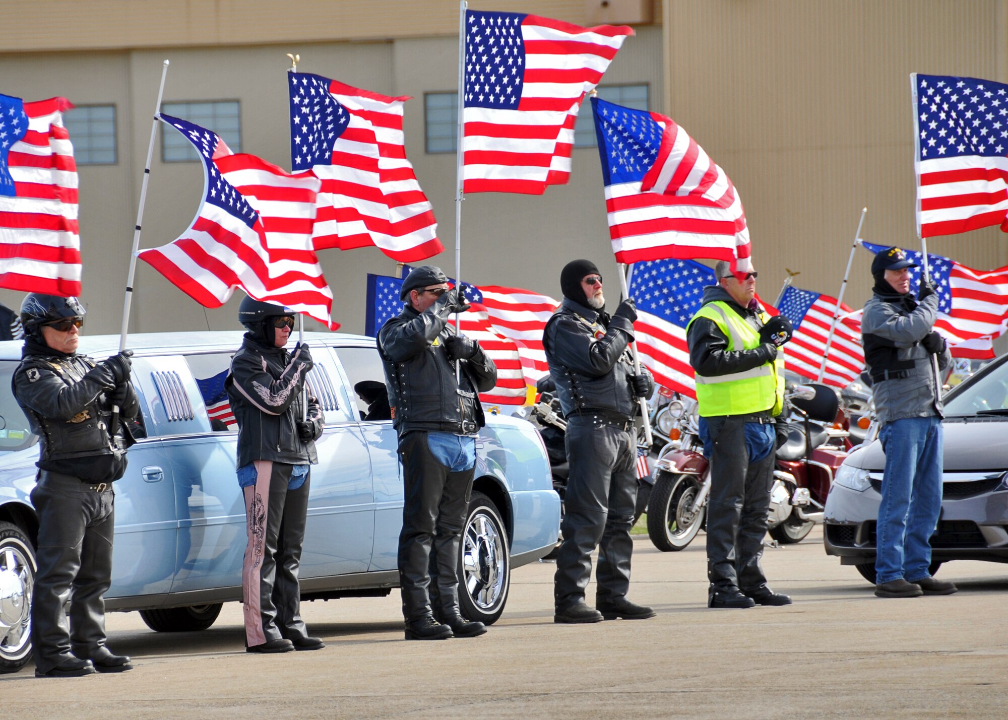 Members of the Niagara Falls Air Reserve Station pay respects to Army Staff Sgt. Michael Lammert 1st Battalion, 84th Field Artillery Regiment, 170th Infantry Brigade Combat Team, April 12, 2011, Niagara Falls, NY. Sgt. Lammert a Tonawanda native, husband and father of two young children gave his life defending his country during his third tour of duty. (U.S. Air Force photo by Staff Sgt. Joseph McKee)