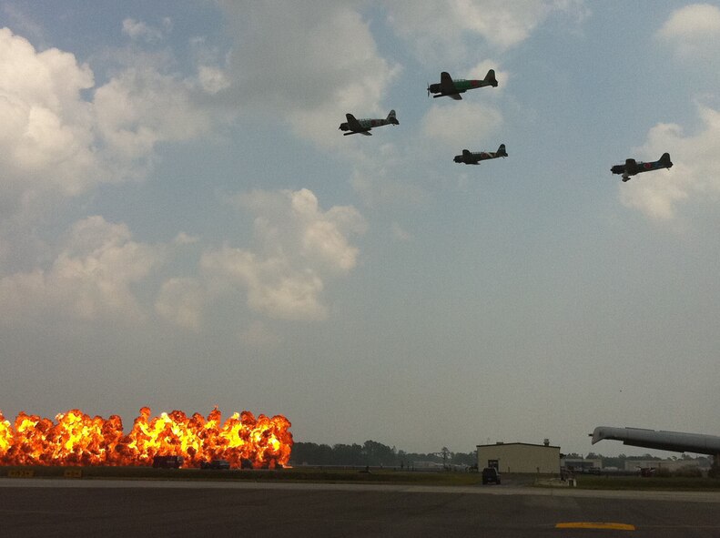 Aircraft painted like World War II Japanese Zeros simulate the Dec. 7, 1941, attack on Pearl Harbor during the Tora! Tora! Tora! performance at Charleston Air Expo 2011 on April 9, 2011, at Joint Base Charleston, S.C. Nearly 80,000 people attended the event to experience more than a dozen aerial performances as well as numerous static aircraft displays. (U.S. Air Force Photo/2nd Lt. Susan Carlson) 