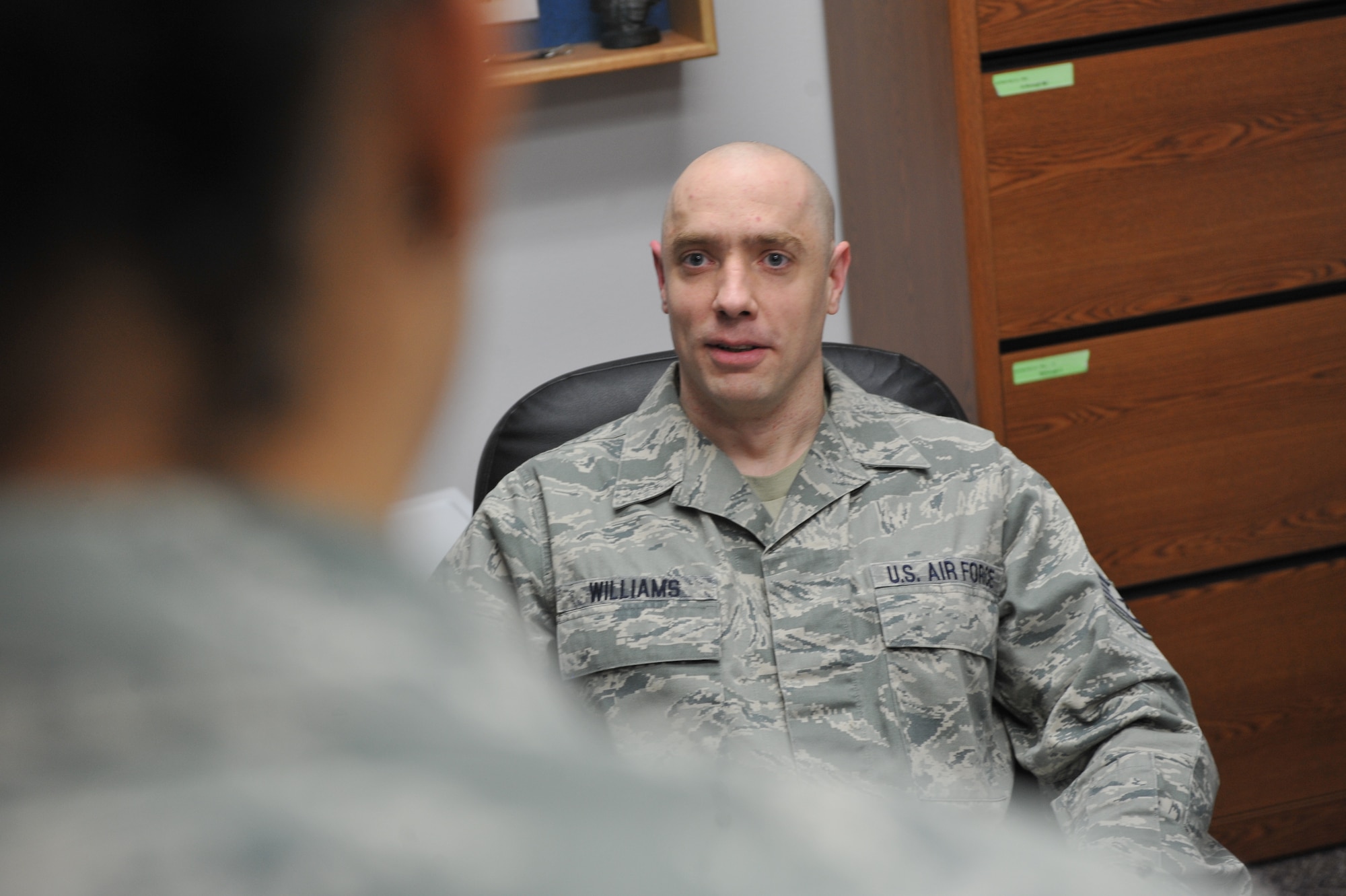 MINOT AIR FORCE BASE, N.D. -- Tech. Sgt. Bradley Williams, a vehicle operator and dispatcher currently assigned as the acting first sergeant for the 5th Logistic Readiness Squadron, is counseling an Airman as part of his duties as the acting first sergeant. Sergeant Williams was honored, along with the other recipients, at the annual Global Strike Command Commander’s Conference held at Barksdale Air Force Base, La., March 24. (U.S. Air Force photo/Staff Sgt. Keith Ballard) 