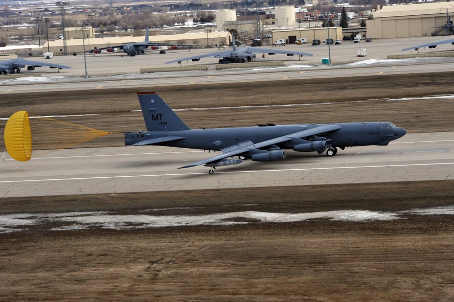MINOT AIR FORCE BASE, N.D. -- A B-52H Stratofortress lands after a five month deployment to Andersen AFB, Guam, here April 7. Team Minot’s 69th Bomb Squadron and 5th Bomb Wing personnel deployed to Andersen AFB last November in support of U.S. Pacific Command’s Continuous Bomber Presence. This was the 69th BS' first deployment since it’s reactivation in September 2009 and the first major combat deployment of aircraft and personnel since World War II. (U.S. Air Force photo/Staff Sgt. Keith Ballard)
