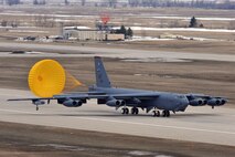 MINOT AIR FORCE BASE, N.D. -- A B-52H Stratofortress lands after a five month deployment to Andersen AFB, Guam, here April 7. Team Minot’s 69th Bomb Squadron and 5th Bomb Wing personnel deployed to Andersen AFB last November in support of U.S. Pacific Command’s Continuous Bomber Presence. This was the 69th BS' first deployment since it’s reactivation in September 2009 and the first major combat deployment of aircraft and personnel since World War II. (U.S. Air Force photo/Staff Sgt. Keith Ballard)
