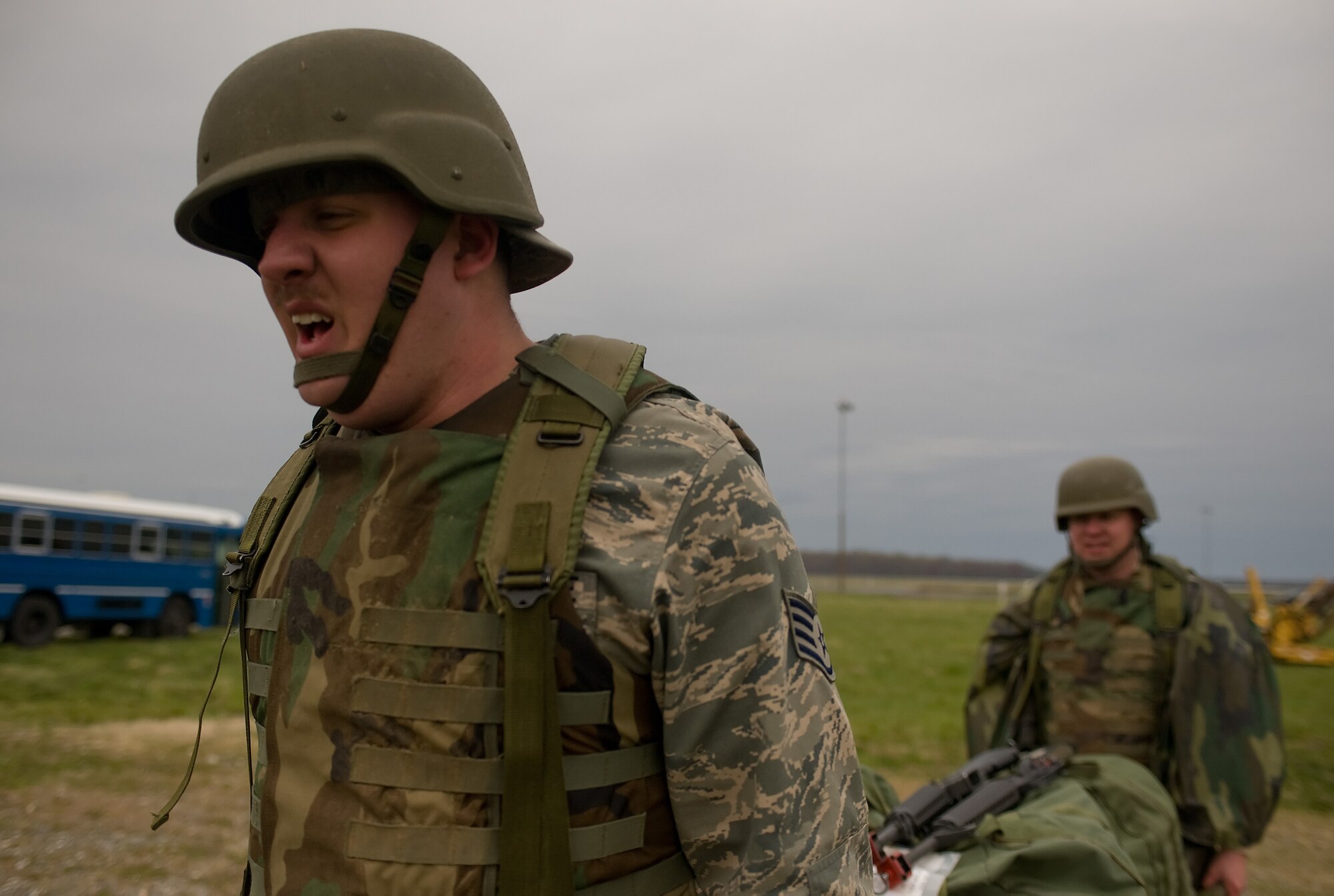 Staff Sgt. Kenneth Best, 436th Logistics Readiness Squadron, and Tech Sgt. Erick Delsite, 436th Maintenance Squadron, carry a litter weighing more than 150 pounds April 8, 2011 in Base X at Dover Air Force Base, Del. This was part of Expeditionary Combat Skills Training, which is a prerequisite for deployment.  (U.S. Air Force photo by Steve Kotecki)