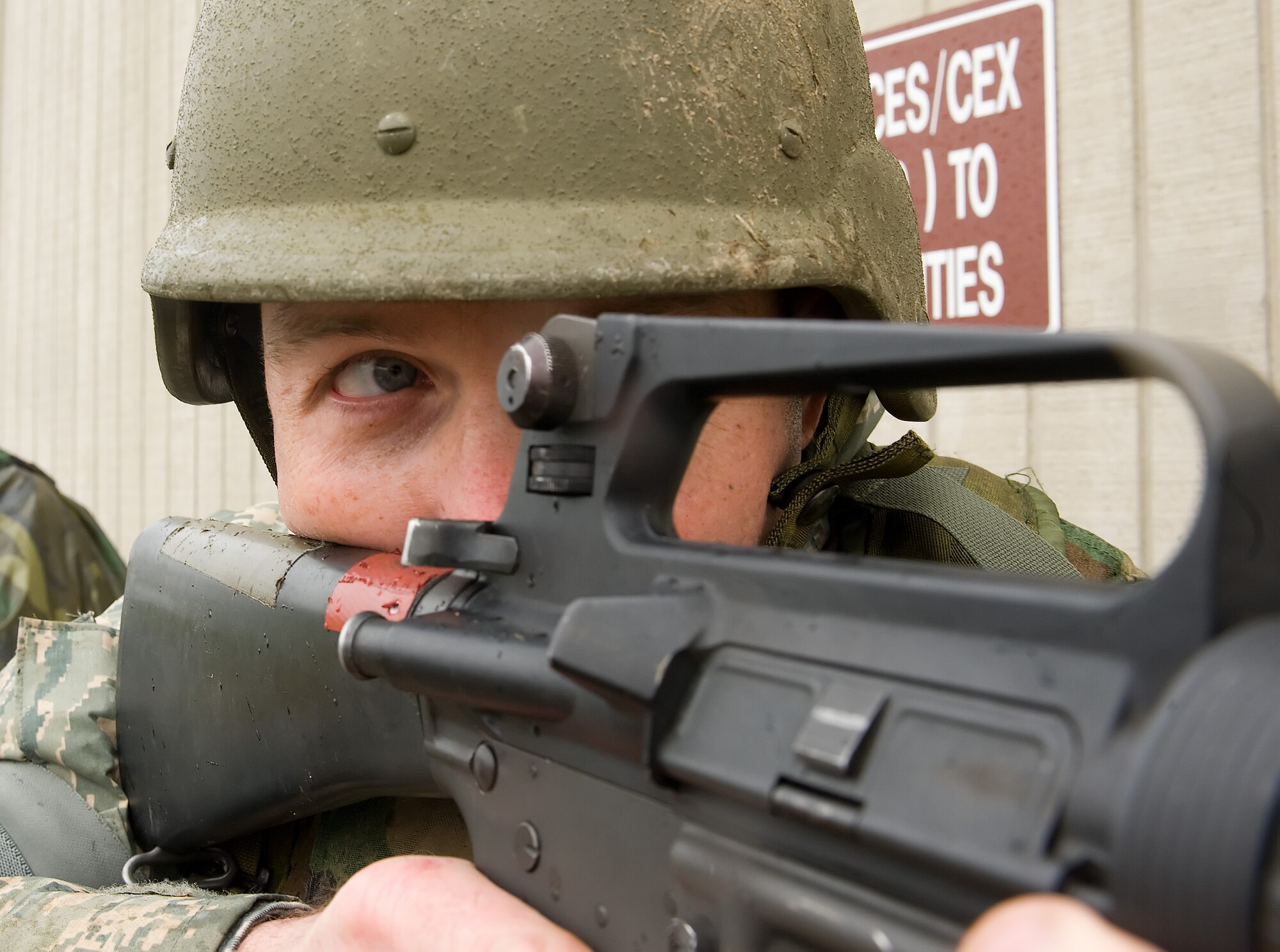 Master Sgt. Tom Dicuirci, 436th Maintenance Squadron, aims a M-16A2 while participating in Mobile Operations and Urban Terrain training at Base X April 8, 2011, at Dover Air Force Base, Del. This was part of Expeditionary Combat Skills Training, which is a prerequisite for deployment.   (U.S. Air Force photo by Steve Kotecki)