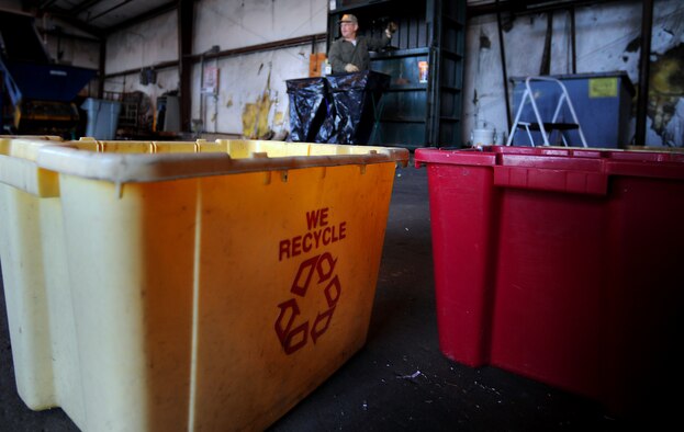 WHITEMAN AIR FORCE BASE, Mo. -- Recycling bins are set in place as members of the Whiteman Recycling Center prepare to sort out recyclables April 11, 2011. The recycling center accepts materials from paper and aluminum to plastic. For each category of recyclable material there are different sections that should be separated, such as colored and clear plastics. (U.S. Air Force photo by Senior Airman Kenny Holston)(Released)  


