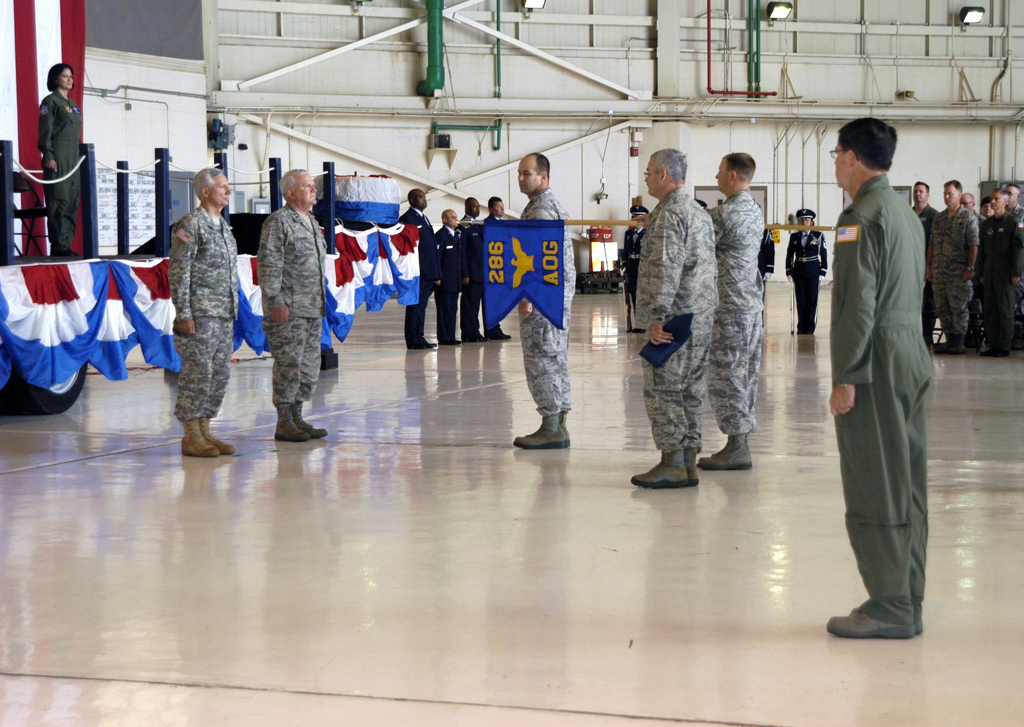 Maj. Gen. William Freeman (left), Mississippi’s Adjutant General and Maj. Gen. Alex Roberts (second from left) commander of the Mississippi Air National Guard, preside over the presentation of the guidon from Col. William Q. Platt (center facing), the new commander for the 286th Air Operations Group at Meridian Air National Guard Base, Miss., April 8, 2011.  (U.S. Air Force photo by Lt. Col. Susan A. Romano)