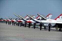 The U.S. Air Force Thunderbirds team accomplish their pre-flight checks during the ground portion of their show during the Charleston Air Expo 2011 on April 9, 2011, at Joint Base Charleston, S.C. The Thunderbirds demonstrated their precision flying for nearly 80,000 people during the Air Expo. (U.S. Air Force Photo/Staff Sgt. Nicole Mickle) 

