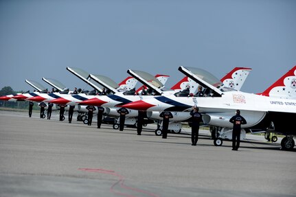 The U.S. Air Force Thunderbirds team accomplish their pre-flight checks during the ground portion of their show during the Charleston Air Expo 2011 April 9.  The Thunderbirds demonstrated their precision flying for nearly 80,000 people during the Air Expo. (U.S. Air Force photo/ Staff Sgt. Nicole Mickle)  