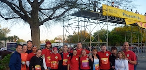 Members of the 437th Airlift Wing's 14th Airlift Squadron and their spouses
participate in the 2011 Cooper River Bridge Run, April 2. The 14 AS
"Pelicans" were among the near 40,000 participants from around the
Charleston area and nation that came to enjoy the run and weekend
festivities. Pictured are: Capt. Brock Schnute, Capt. Nick Altenburg and his wife Corrie, 
Capt. Andrew Vega and his wife Sarah, Capt. Erica McCaslin and her husband Brandon, Capt. Mike Maughan, Lt. Natasha Sergi, Capt. Justin Taylor, Capt. Alicia Dittus, Lt. Col. Tony Carr and his wife Christine, Manu Loweg, Joan Tufts
and Lt. Col. Tom Loweg. 