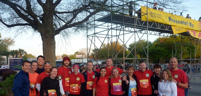 Members of the 437th Airlift Wing's 14th Airlift Squadron and their spouses
participate in the 2011 Cooper River Bridge Run, April 2. The 14 AS
"Pelicans" were among the near 40,000 participants from around the
Charleston area and nation that came to enjoy the run and weekend
festivities. Pictured are: Capt. Brock Schnute, Capt. Nick Altenburg and his wife Corrie, 
Capt. Andrew Vega and his wife Sarah, Capt. Erica McCaslin and her husband Brandon, Capt. Mike Maughan, Lt. Natasha Sergi, Capt. Justin Taylor, Capt. Alicia Dittus, Lt. Col. Tony Carr and his wife Christine, Manu Loweg, Joan Tufts
and Lt. Col. Tom Loweg. 