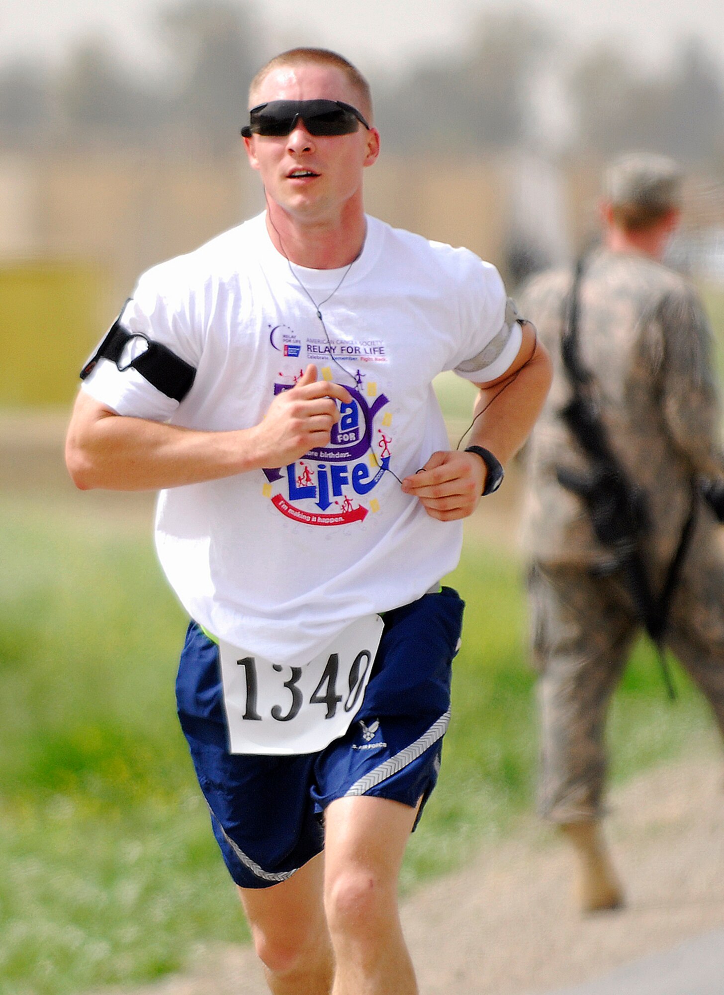 KIRKUK REGIONAL AIR BASE, Iraq -- Tech. Sgt. Ryan Smith, 321st Expeditionary Logistics Readiness Squadron, makes his way toward the finish line during the Relay for Life 5K run/walk April 2. (U.S. Air Force courtesy photo)