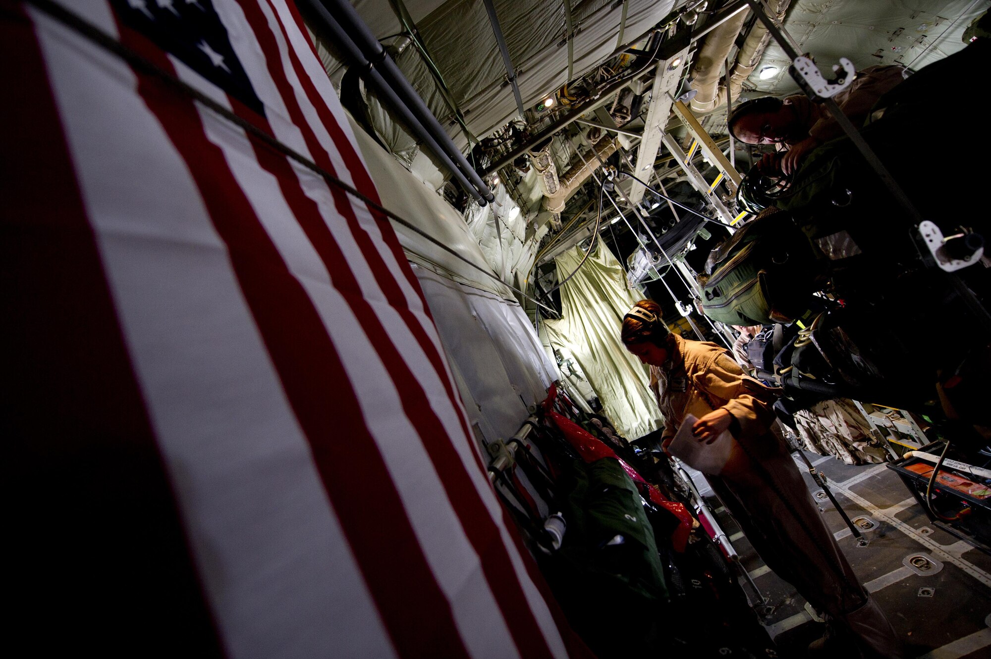 Tech. Sgt. Rachel Anderson, 379th Expeditionary Aeromedical Evacuation Squadron aeromedical evacuation technician, inventories medical equipment on board a C-130 Hercules assigned to the 746th Expeditionary Airlift Squadron during an aeromedical evacuation mission at an undisclosed location in Southwest Asia. Anderson is deployed from the 86th Aeromedical Evacuation Squadron, Ramstein Air Base, Germany. (U.S. Air Force photo/Master Sgt. Adrian Cadiz)