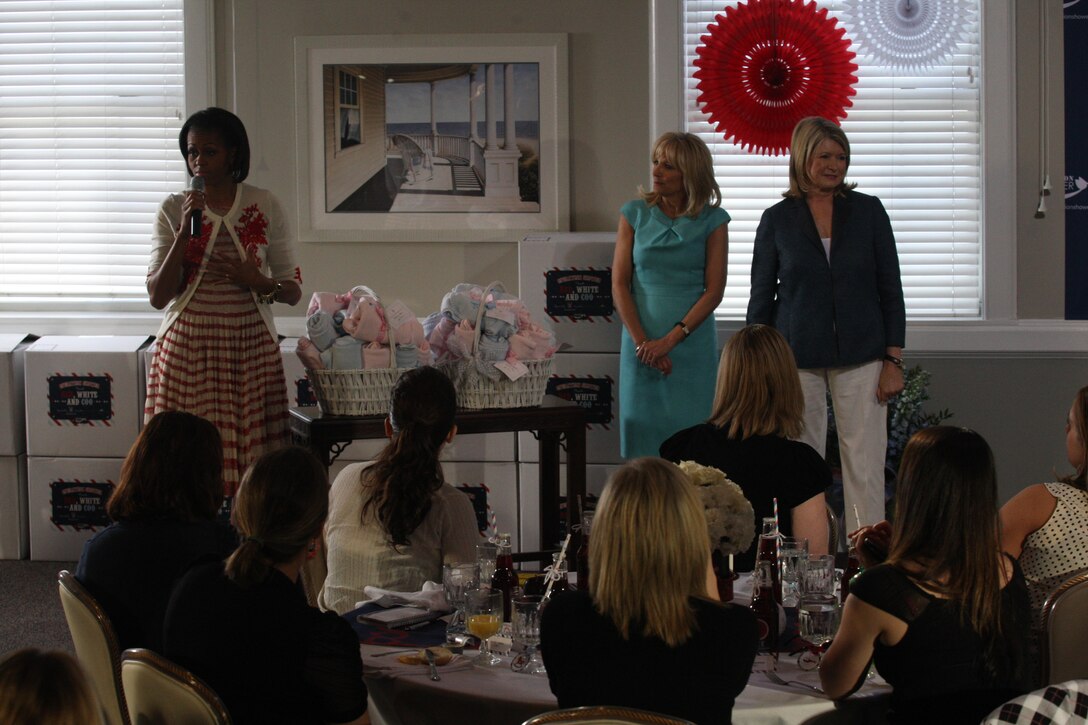 (left to right) Michelle Obama, first lady of the United States, Dr. Jill Biden, wife of Vice President Joe Biden and Martha Stewart, famed television personality, speak to a group of 40 pregnant Marine wives with deployed or injured spouses along with during the Operation Baby Shower event at the Ball Center aboard Marine Corps Base Camp Lejeune, April 13. Operation Baby Shower is an event dedicated to assisting expecting Marine wives while their husbands are away by giving them donated items and funds.