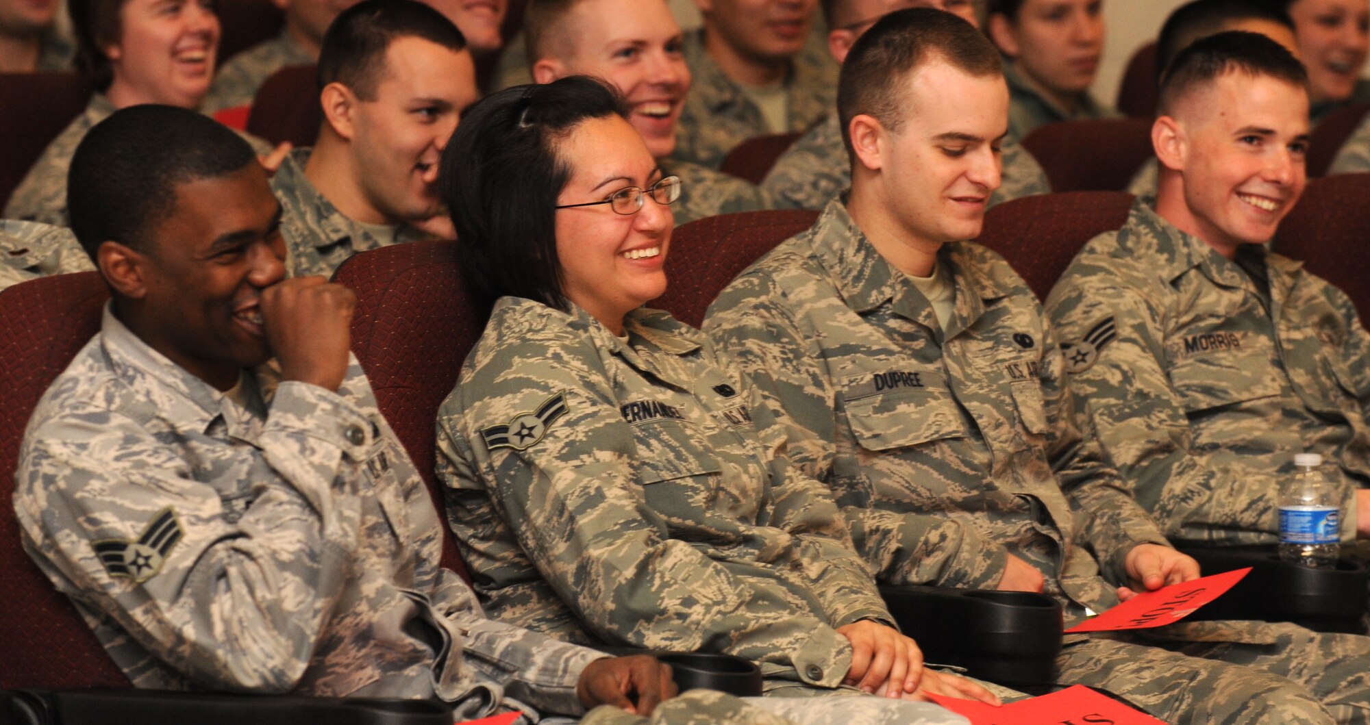 MOUNTAIN HOME AIR FORCE BASE, Idaho – Gunfighters laugh as they watch the final performance of the comedy show, Sex Signals at the base theater April 8. The traveling program provides guidance and information on issues dealing with sexual assault. (U.S. Air Force photo by Senior Airman Debbie Lockhart)