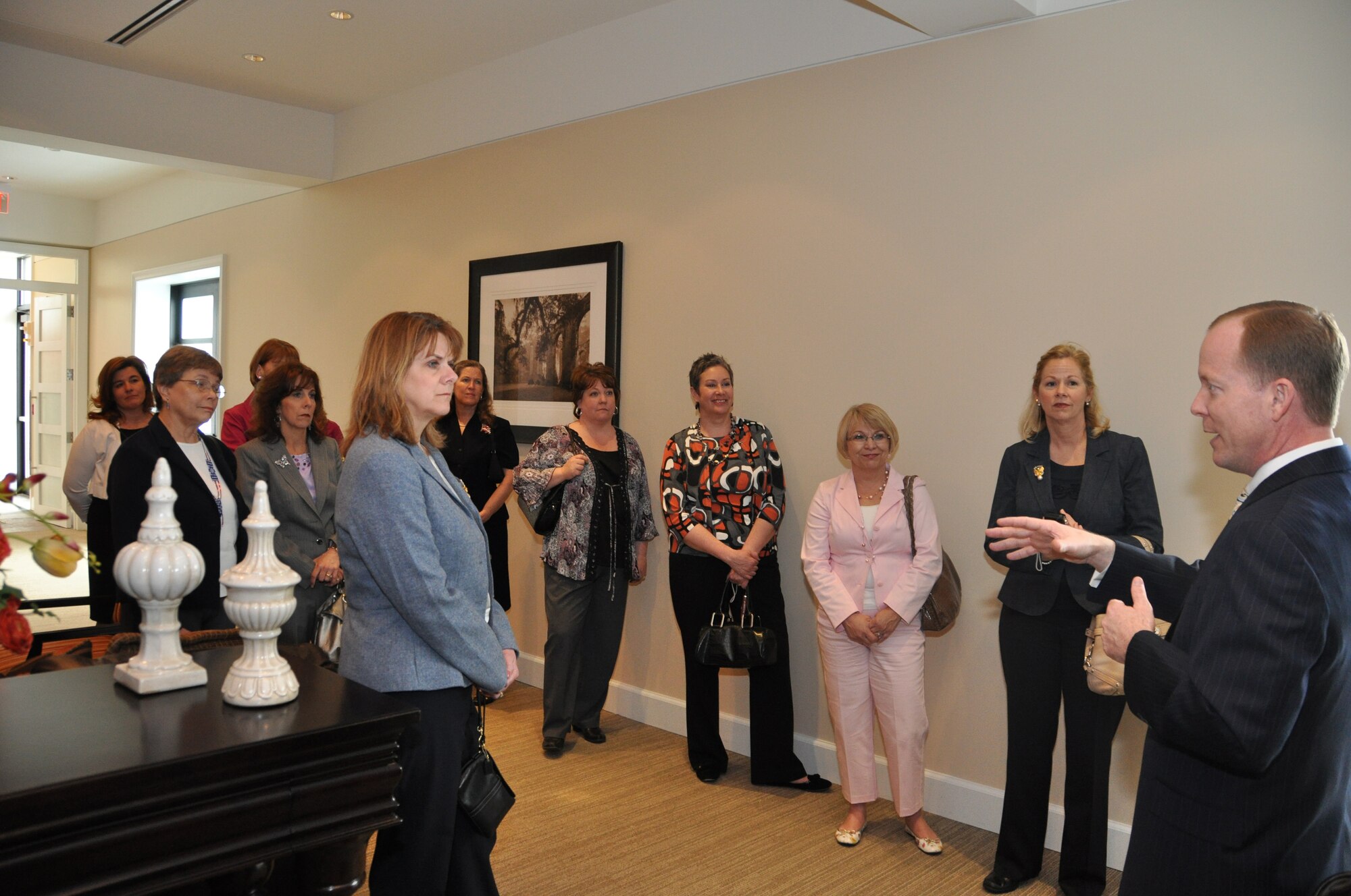 Members of the Air Force Officers’ Wives’ Club tour the Center for the Families of the Fallen April 12, 2011. The group presented a check for $1,000 to the Friends of the Fallen, a community-based volunteer group which provides service and assistance to families who come to Dover Air Force Base to witness the Dignified Transfer of their loved ones. (U.S. Air Force photo/Capt. Raymond Maguire)