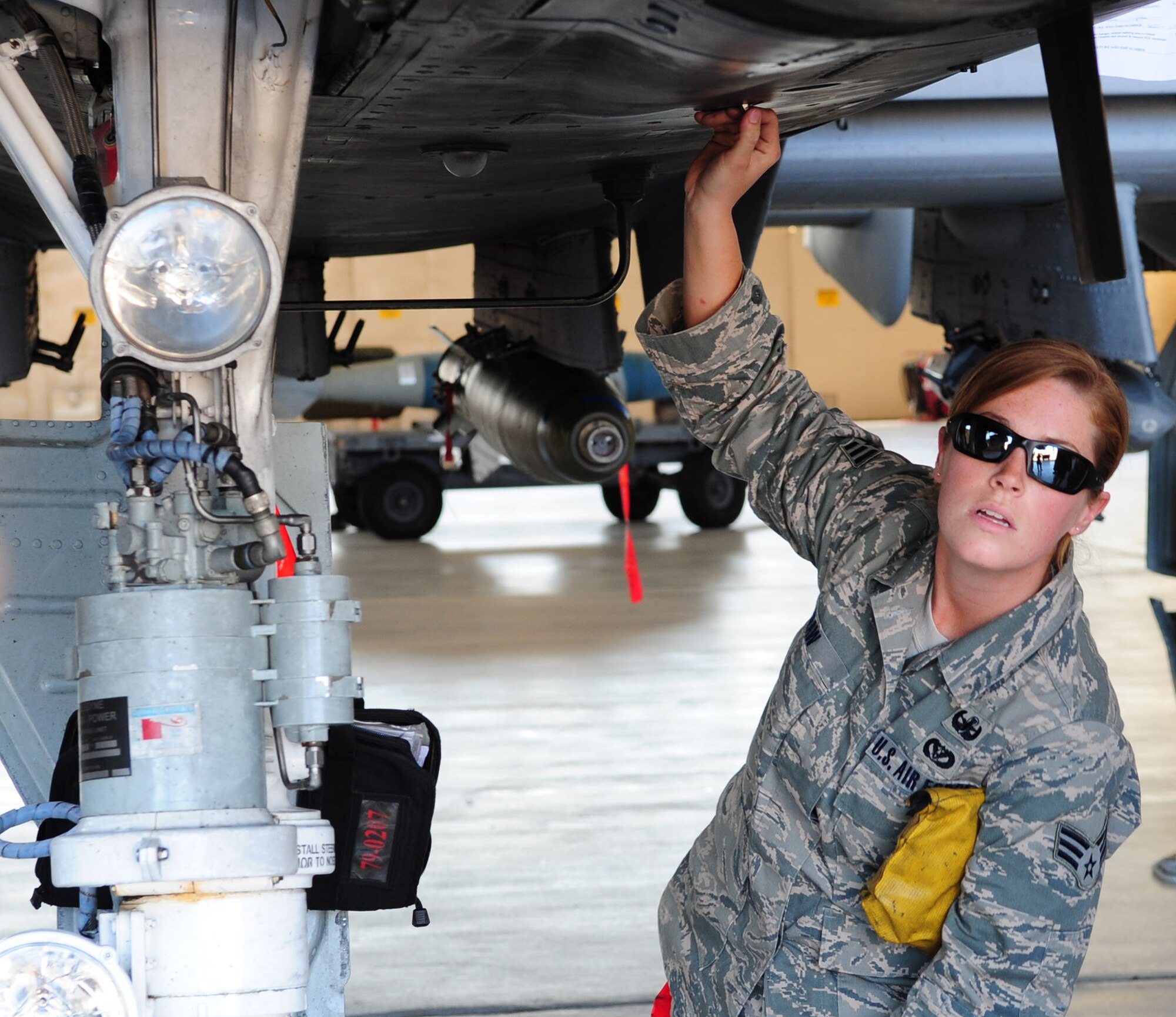 Senior Airman Roxy Shaw, 23rd Civil Engineer Squadron explosive ordnance disposal apprentice, undergoes an evaluation during a simulated emergency A-10C Thunderbolt II crisis April 12 at Moody Air Force Base, Ga. The training will go toward Airman Shaw’s upgrade to an EOD journeyman. (U.S. Air Force photo/Senior Airman Stephanie Mancha)(RELEASED) 