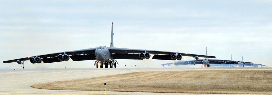 MINOT AIR FORCE BASE, N.D. -- A flight of B-52H Stratofortress’ from the 5th Bomb Wing prepare to take off during a rapid launch exercise here April 13. As a finale to the two week-long exercise, several B-52s took off in rapid succession, signaling the end of the training mission. (U.S. Air Force photo/Airman 1st Class Jessica McConnell)
