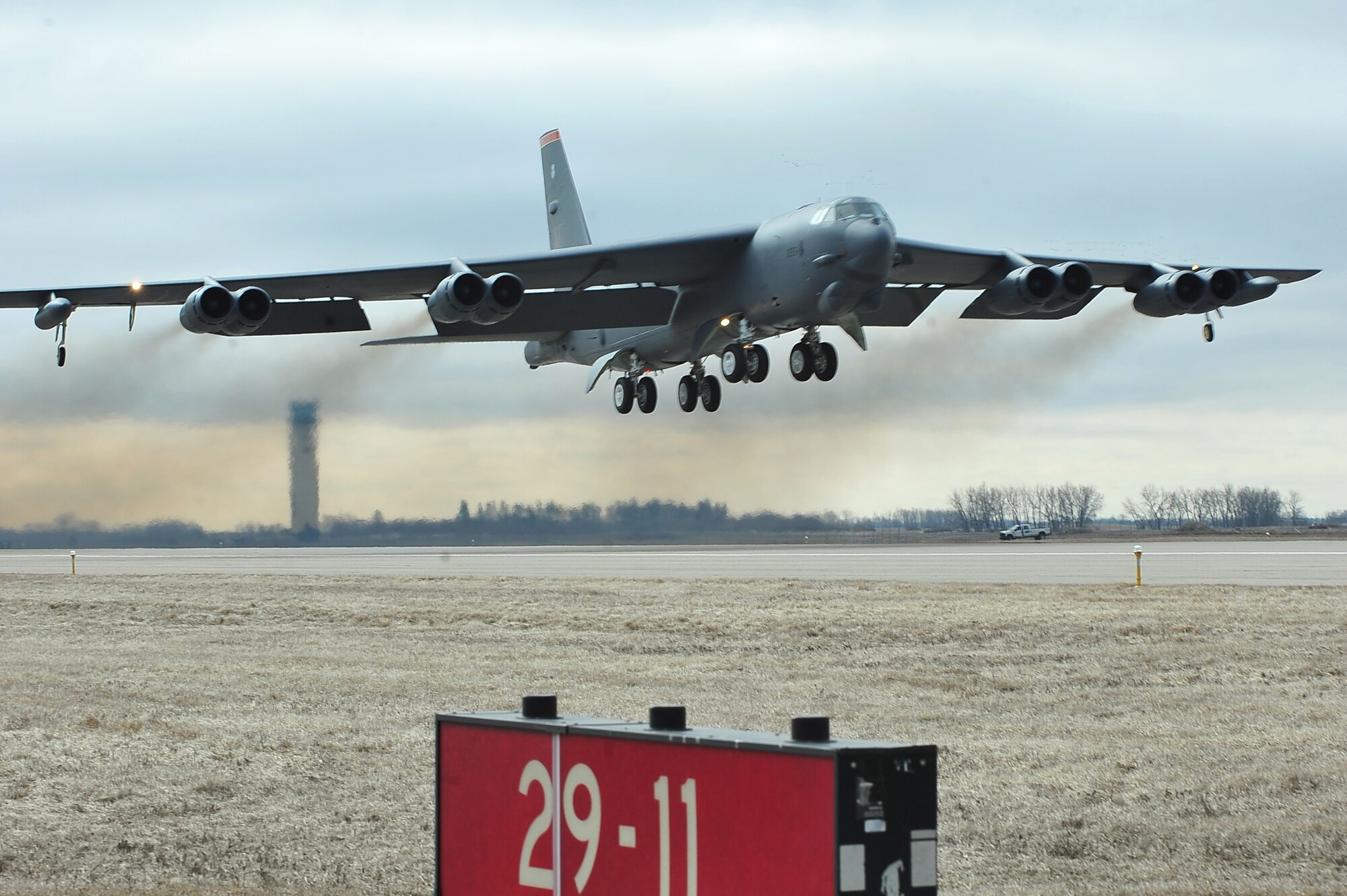 MINOT AIR FORCE BASE, N.D. -- A B-52H Stratofortress from the 5th Bomb Wing takes off during a rapid launch exercise here April 13. As a finale to the two week-long exercise, several B-52s took off in rapid succession, signaling the end of the training mission. (U.S. Air Force photo/Senior Airman Jesse Lopez)
