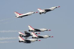 The U.S. Air Force Thunderbirds team performs an aerial maneuver during the Charleston Air Expo 2011 on April 9, 2011, at Joint Base Charleston, S.C. The Thunderbirds demonstrated their precision flying for nearly 80,000 people during the Expo. (U.S. Air Force Photo/Tech. Sgt. Chrissy Best)