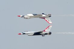 The U.S. Air Force Thunderbirds team performs an aerial maneuver during the Charleston Air Expo 2011 on April 9, 2011, at Joint Base Charleston, S.C. The Thunderbirds demonstrated their precision flying for nearly 80,000 people during the Expo. (U.S. Air Force Photo/Tech. Sgt. Chrissy Best)