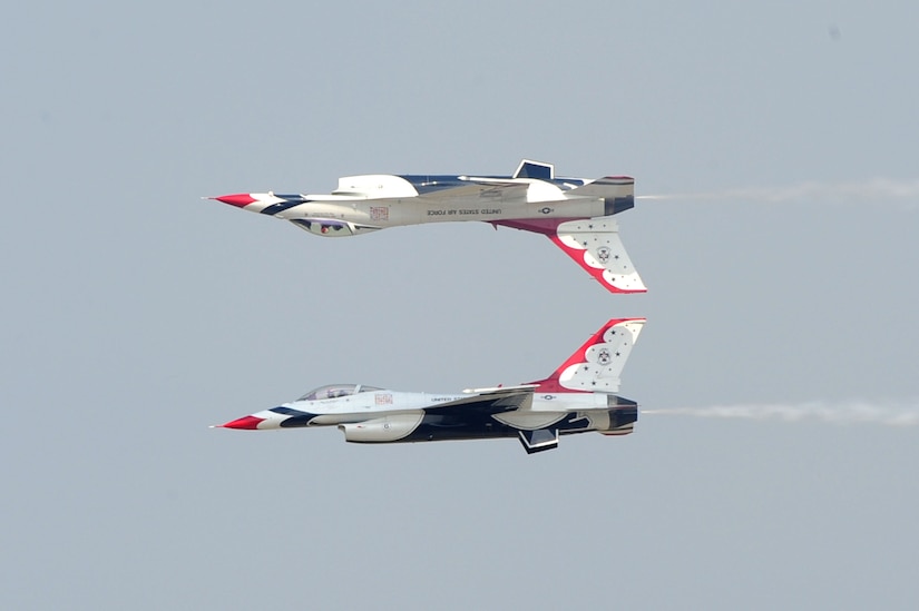 The U.S. Air Force Thunderbirds team performs an aerial maneuver during the Charleston Air Expo 2011 Apr. 9. The Thunderbirds demonstrated their precision flying for nearly 80,000 people during the Expo. (U.S. Air Force photo by Tech. Sgt. Chrissy Best)
