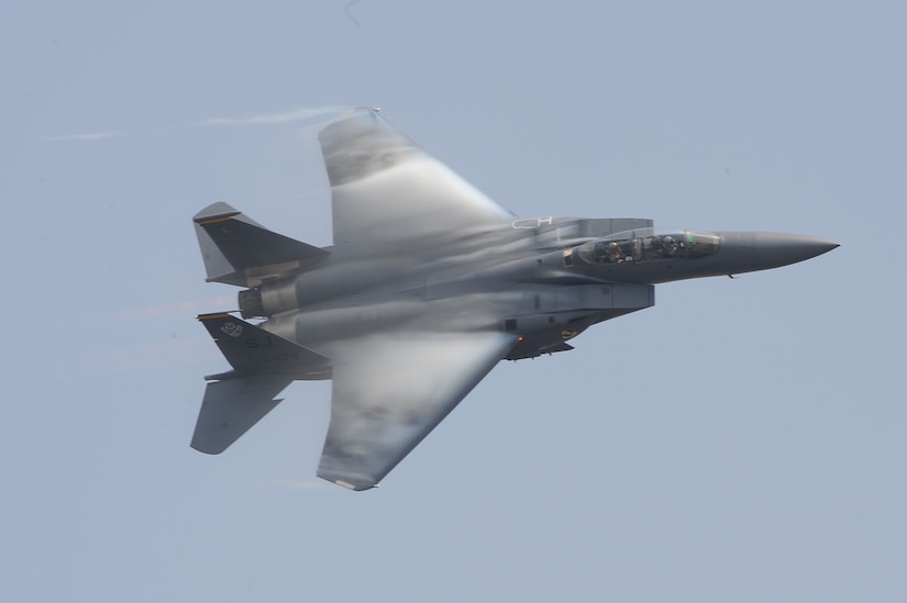 An F-15E Strike Eagle performs during the Charleston Air Expo 2011 Apr. 9. All the demonstrators displayed their precision flying for nearly 80,000 people during the Expo. The F-15E is stationed at Seymour Johnson, N.C. (U.S. Air Force photo by Tech. Sgt. Chrissy Best)
