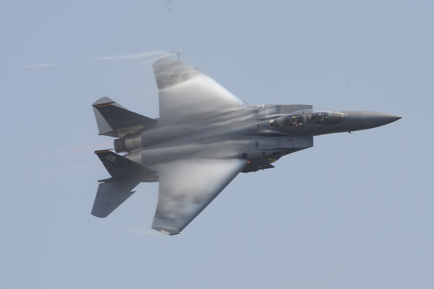 An F-15E Strike Eagle performs during the Charleston Air Expo 2011 on April 9, 2011, at Joint Base Charleston, S.C. All the demonstrators displayed their precision flying for nearly 80,000 people during the Expo. The F-15E is stationed at Seymour Johnson, N.C. (U.S. Air Force Photo/Tech. Sgt. Chrissy Best)