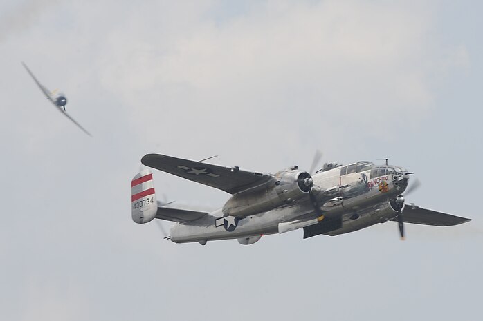 The North American B-25J Mitchell Bomber "Panchito" performs during the Charleston Air Expo 2011 Apr. 9. All the demonstrators displayed their precision flying for nearly 80,000 people during the Expo. The B-25J can fly at speeds of 275 mph and can reach a surface ceiling of 24,000 feet. (U.S. Air Force photo by Tech. Sgt. Chrissy Best)
