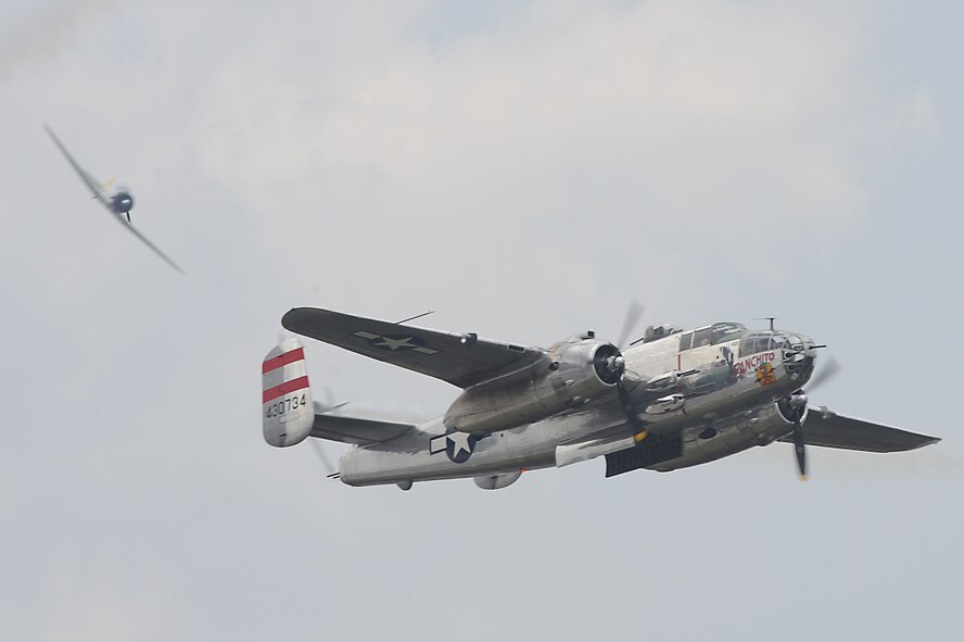 The North American B-25J Mitchell Bomber "Panchito" performs during the Charleston Air Expo 2011 on April 9, 2011, at Joint Base Charleston, S.C. All the demonstrators displayed their precision flying for nearly 80,000 people during the Expo. The B-25J can fly at speeds of 275 mph and can reach a surface ceiling of 24,000 feet. (U.S. Air Force Photo/Tech. Sgt. Chrissy Best) 