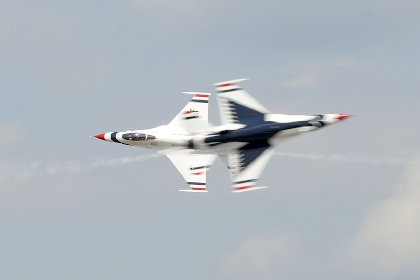 The U.S. Air Force Thunderbirds team performs an aerial maneuver during the Charleston Air Expo 2011 Apr. 9. The Thunderbirds demonstrated their precision flying for nearly 80,000 people during the Expo. (U.S. Air Force photo by Tech. Sgt. Chrissy Best)