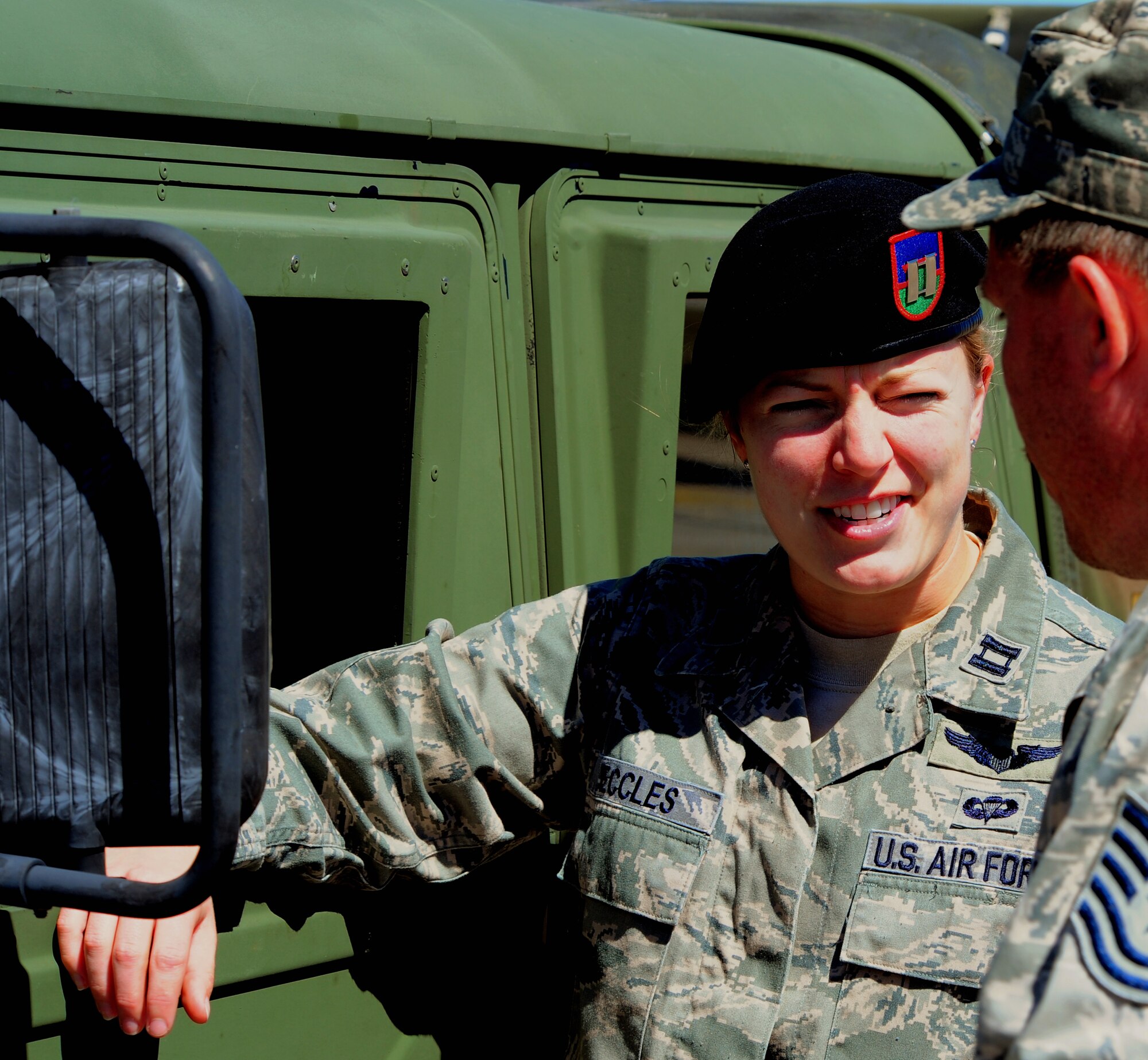SHAW AIR FORCE BASE, S.C. -- Capt. Sarah Eccles, 682nd Air Support Operations air liaison officer, talks with an Airman about the high-mobility multi-purpose vehicle at the 682nd ASOS April 5, 2011. Captain Eccles is also an F-16 pilot who is currently not flying during her alpha tour as an ALO. (U.S. Air Force photo/ Airman 1st Class Daniel Phelps)

