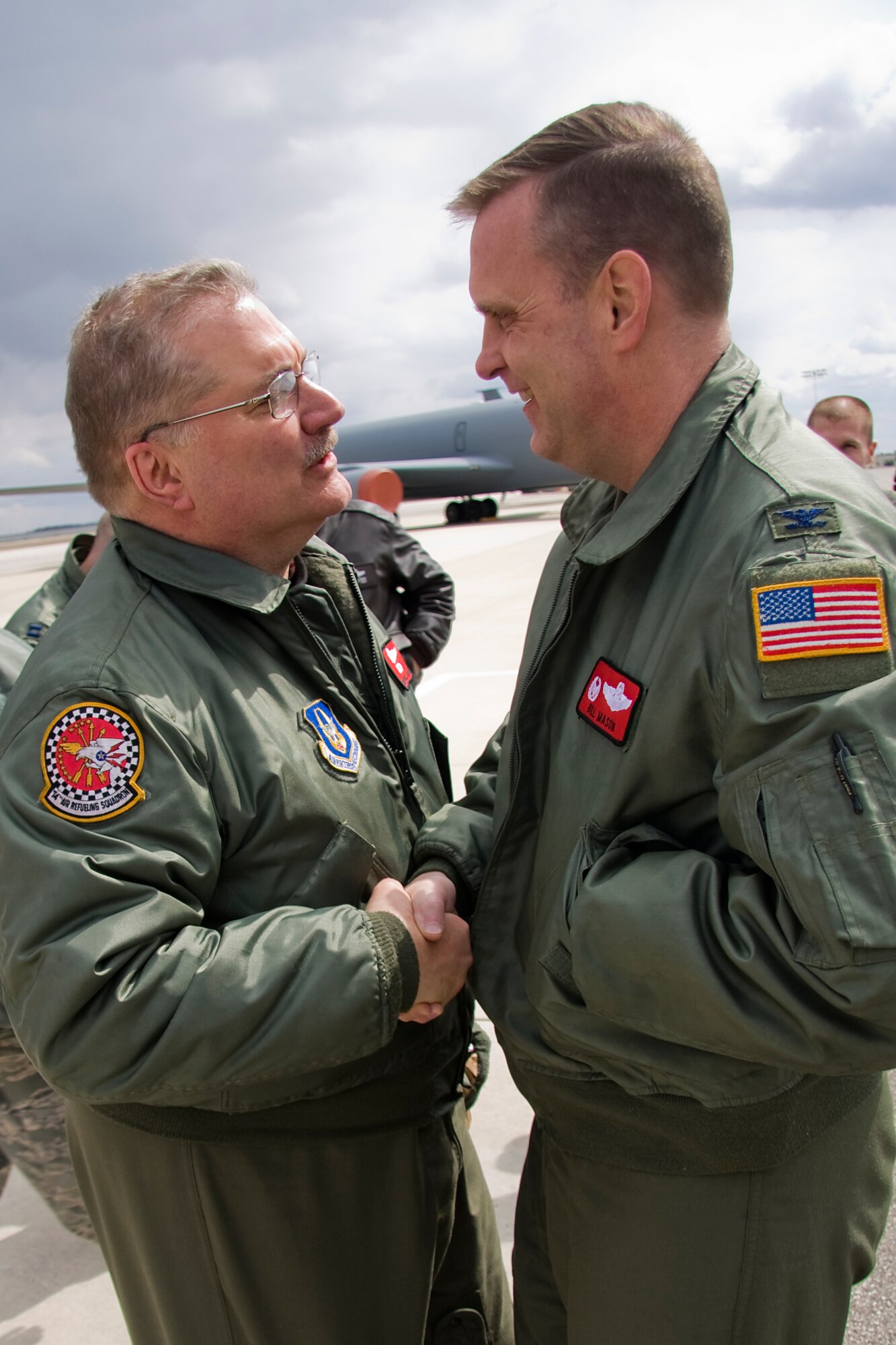 GRISSOM AIR RESERVE BASE, Ind. --  Col. William Mason, 434th Operations Group commander, congratulates Senior Master Sgt. Paul "Doogie" Houser, 434th Operations Support Squadron in-flight refueling manager, for achieving 10,000 flight hours April 5. Sergeant Houser was greeted by friends, family and coworkers after reaching his 10,000th hour while refueling a B-52 from the 307th Bomb Wing at Barksdale Air Force Base, La. (U.S. Air Force photo/Tech. Sgt. Mark R. W. Orders-Woempner)

