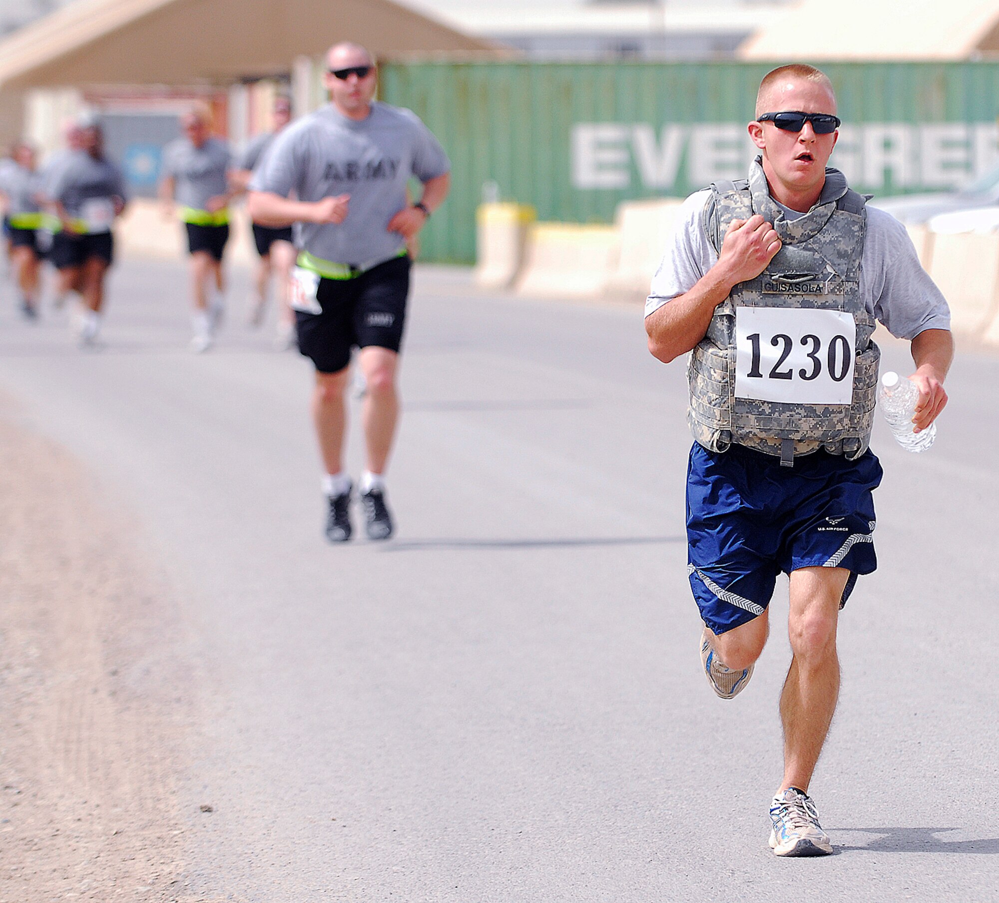 Airman 1st Class Joshua Guisasola finishes the Relay for Life April 2, 2011, at Kirkuk Regional Air Base, Iraq. Nearly 200 people participated in the event, raising nearly than $4,000 for the American Cancer Society. Airman Guisasola is vehicle maintainer assigned to the 321st Expeditionary Logistics Readiness Squadron. (Courtesy photo)
